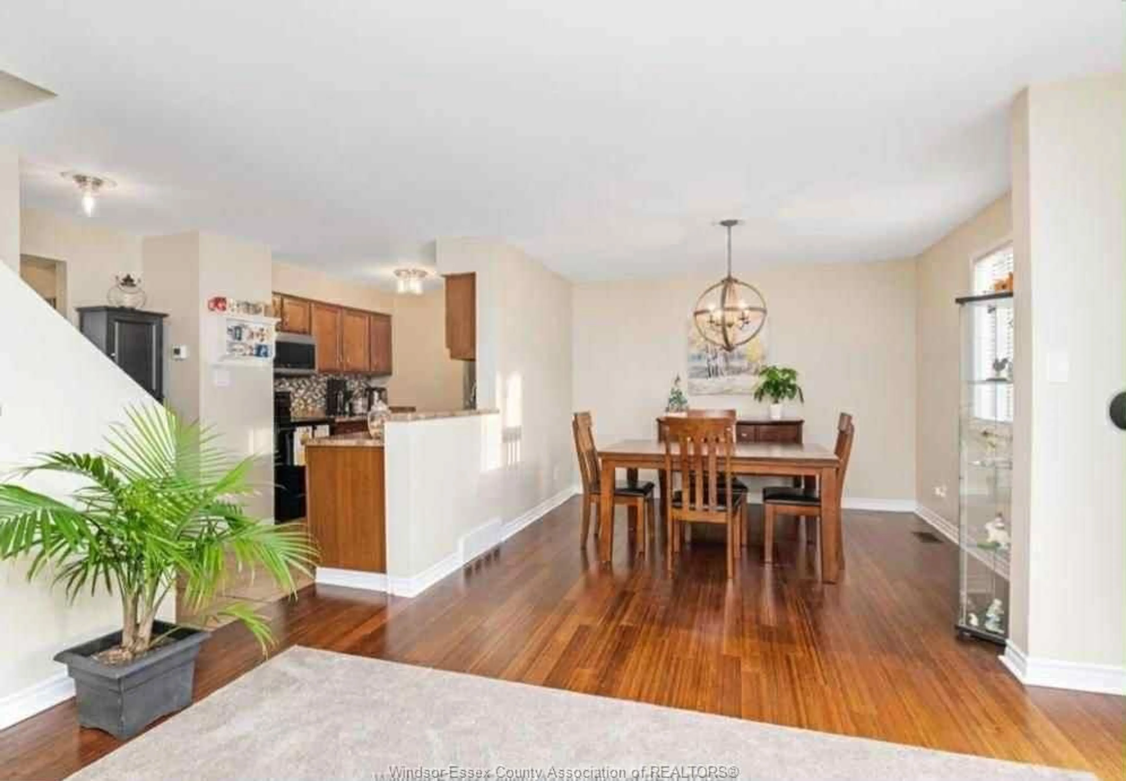 Open concept kitchen, wood/laminate floor for 1285 CARDINAL Cres #37, Tecumseh Ontario N8N 4V1