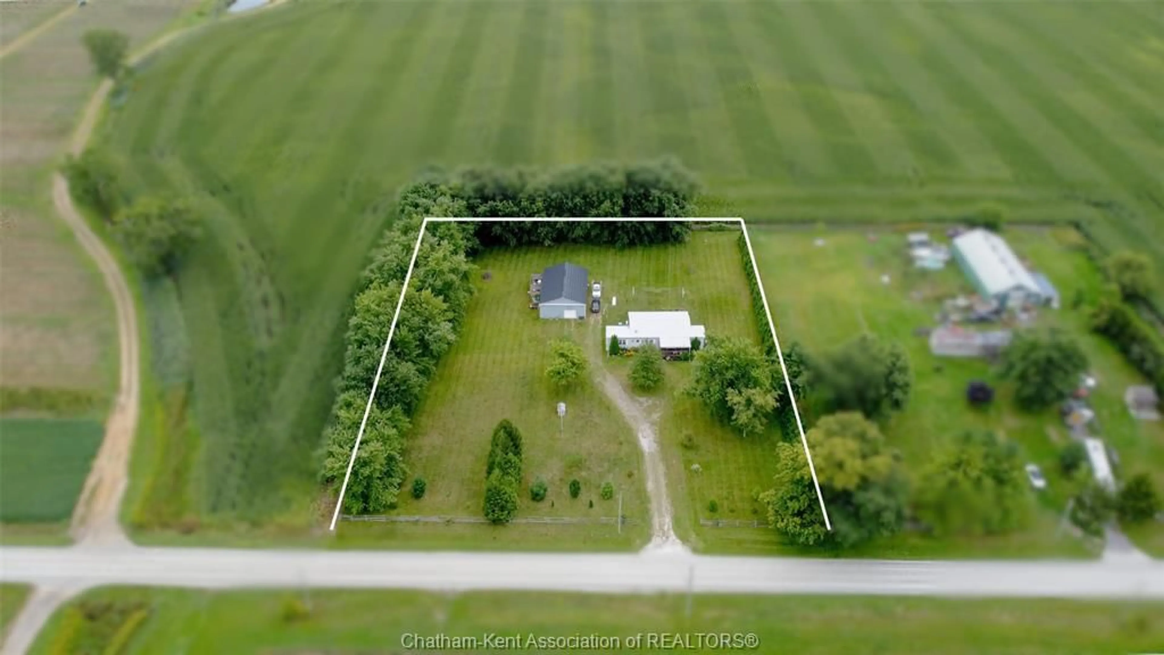 A pic from outside/outdoor area/front of a property/back of a property/a pic from drone, building for 710 JOHNSTON Rd, Dawn-Euphemia Ontario N0P 1C0