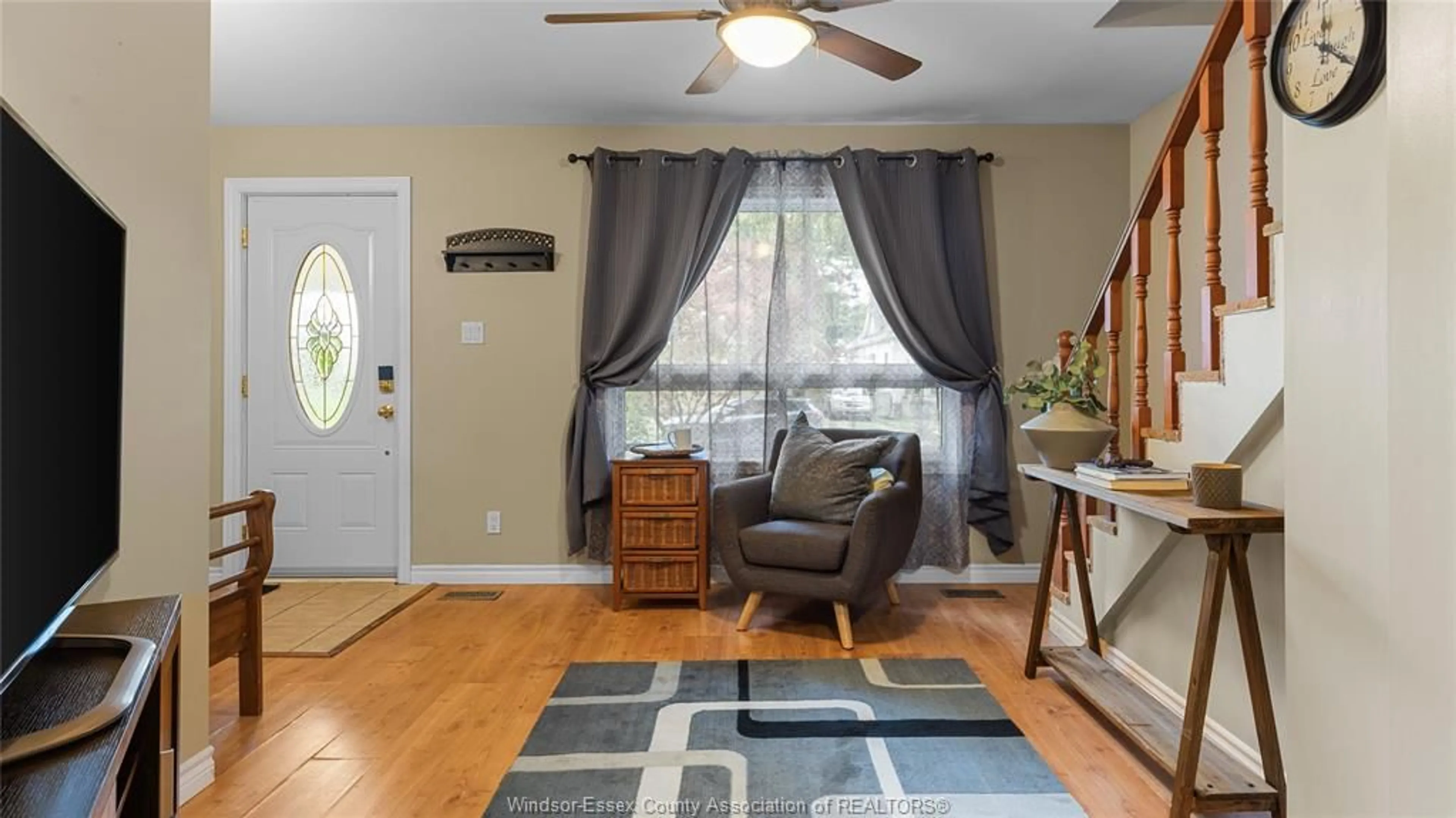 Living room with furniture, wood/laminate floor for 1708 BENJAMIN Ave, Windsor Ontario N8X 4N6