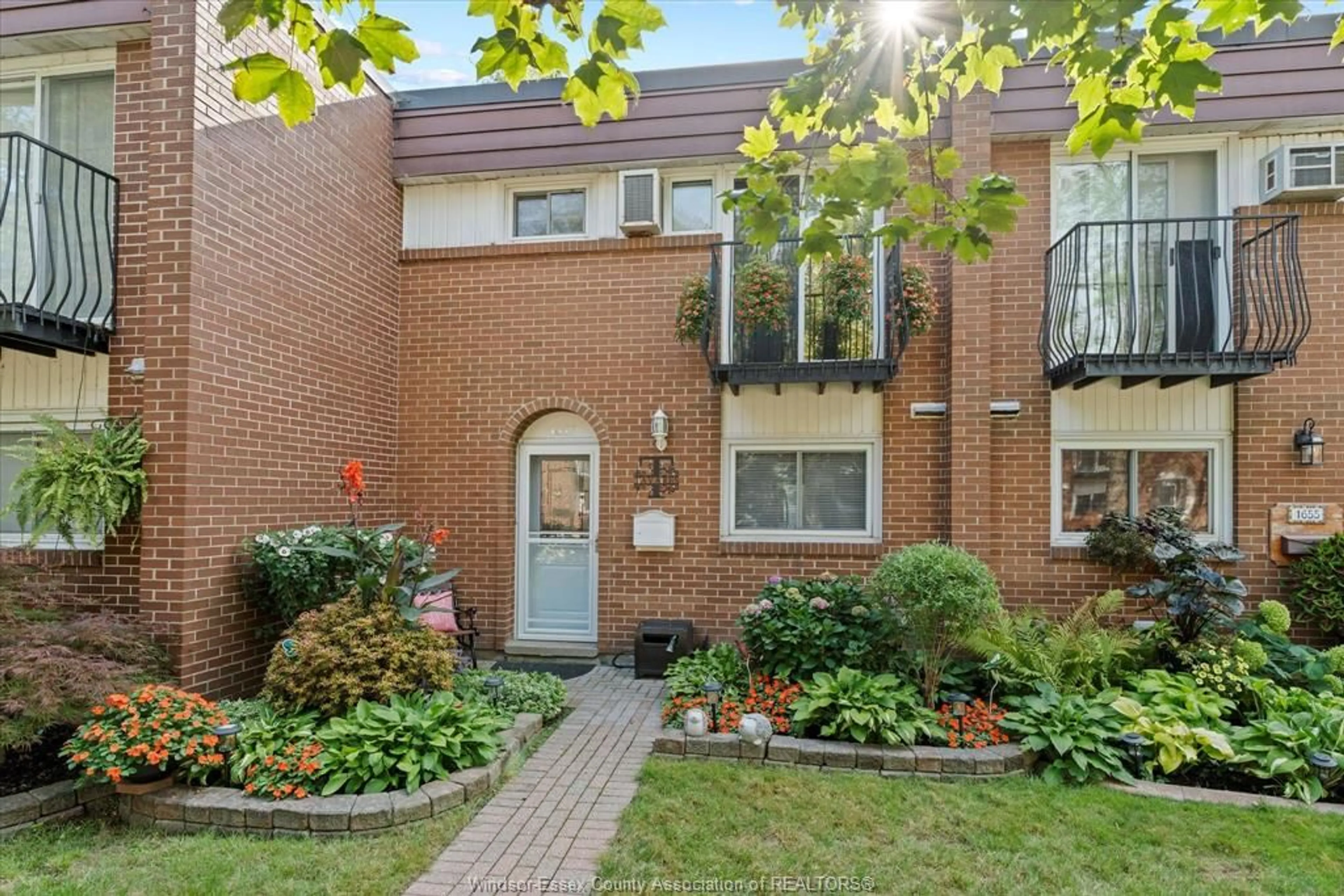 Home with brick exterior material, street for 1657 EASTGATE ESTATES #60, Windsor Ontario N8T 2S8