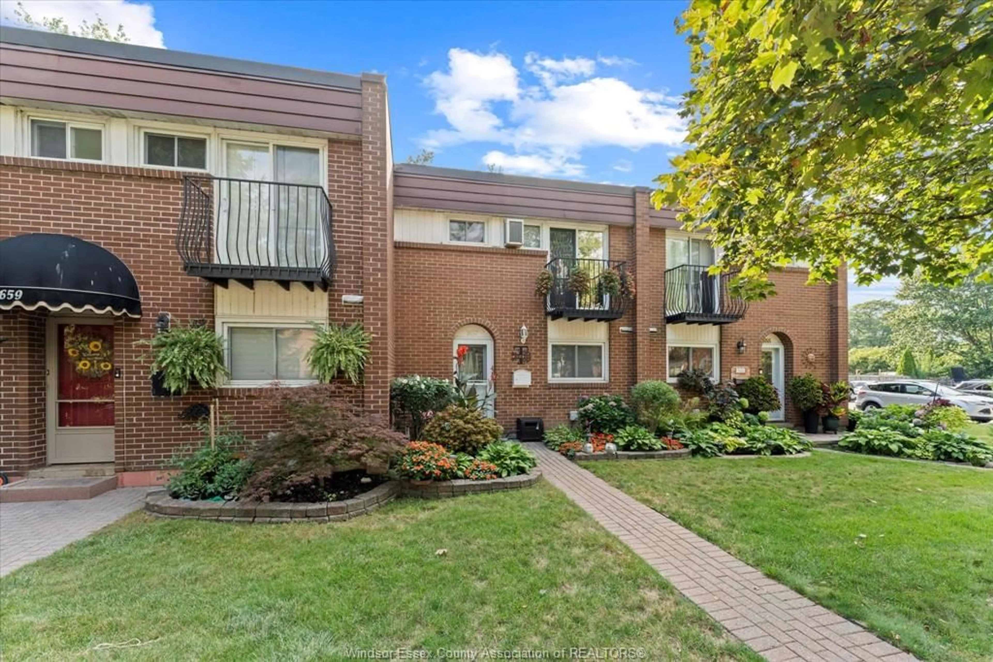 Home with brick exterior material, street for 1657 EASTGATE ESTATES #60, Windsor Ontario N8T 2S8