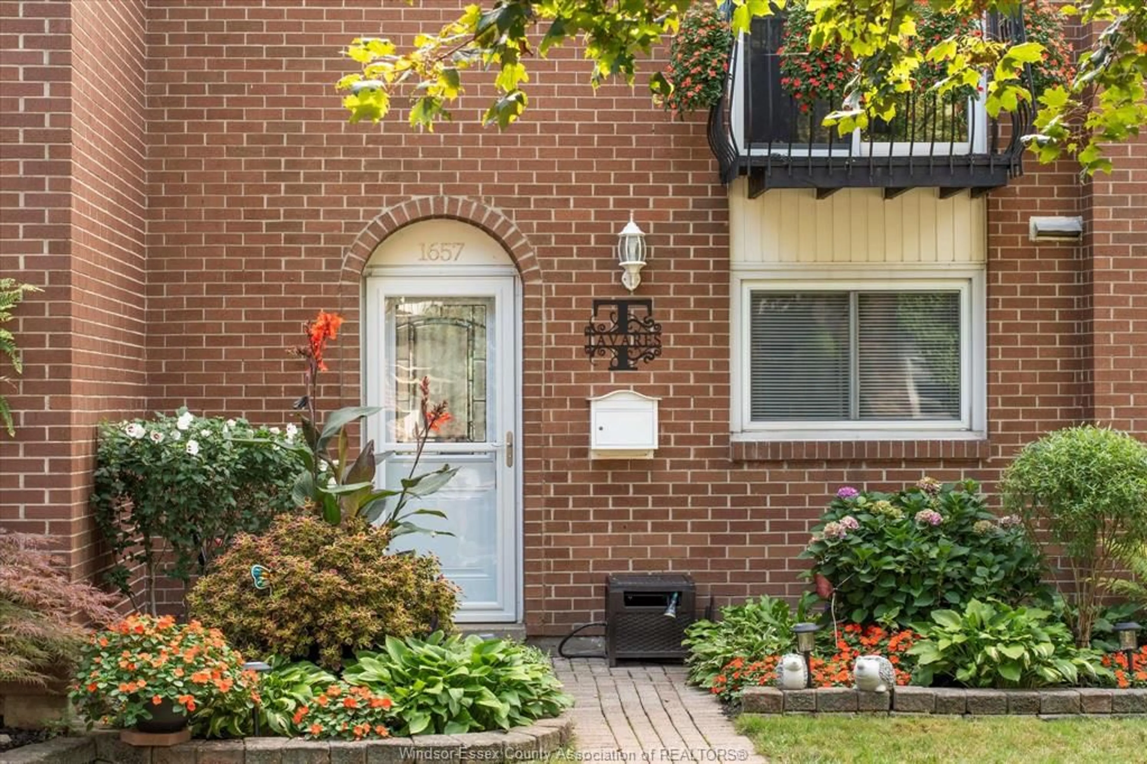 Home with brick exterior material, street for 1657 EASTGATE ESTATES #60, Windsor Ontario N8T 2S8