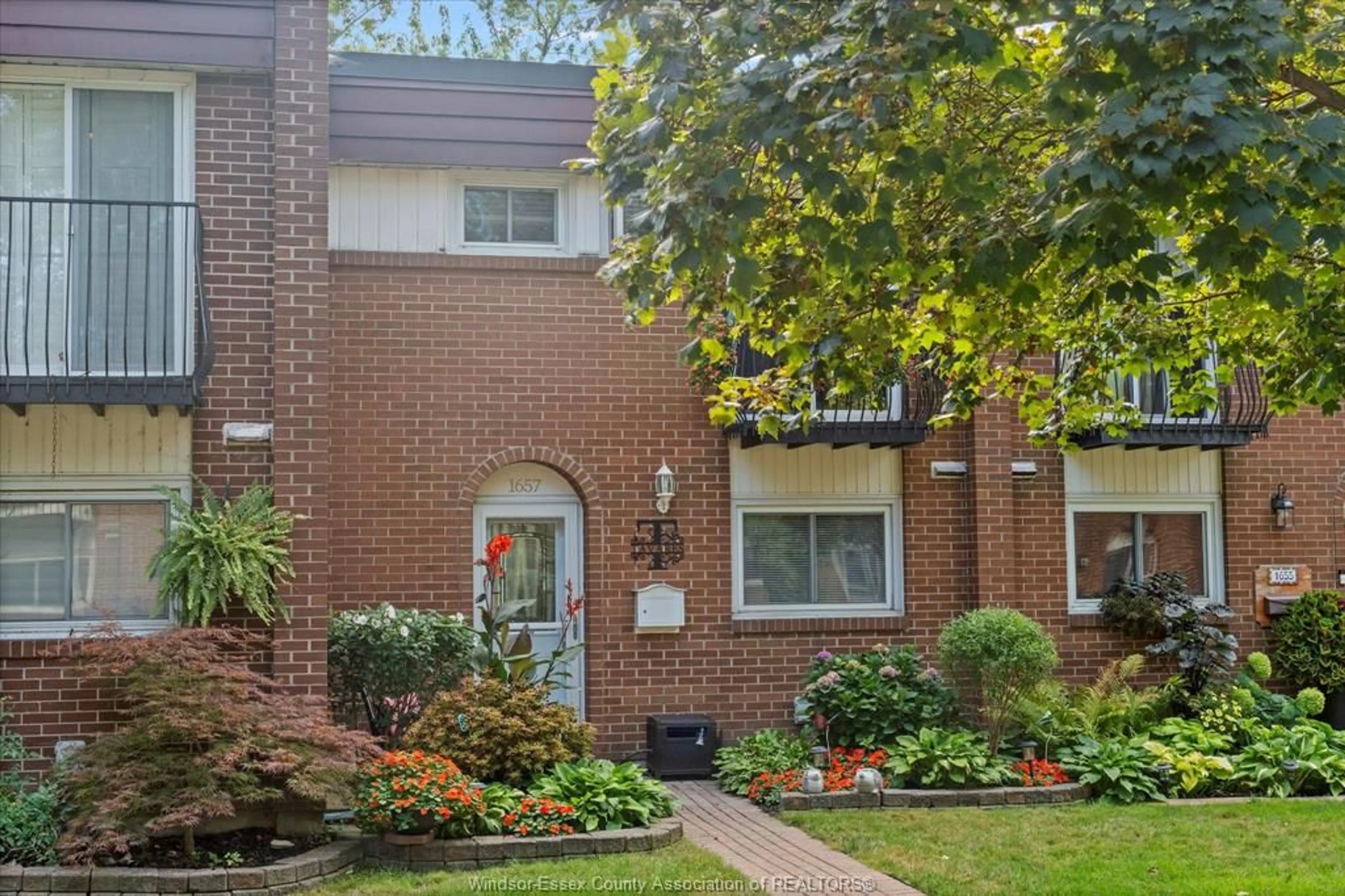 Home with brick exterior material, street for 1657 EASTGATE ESTATES #60, Windsor Ontario N8T 2S8