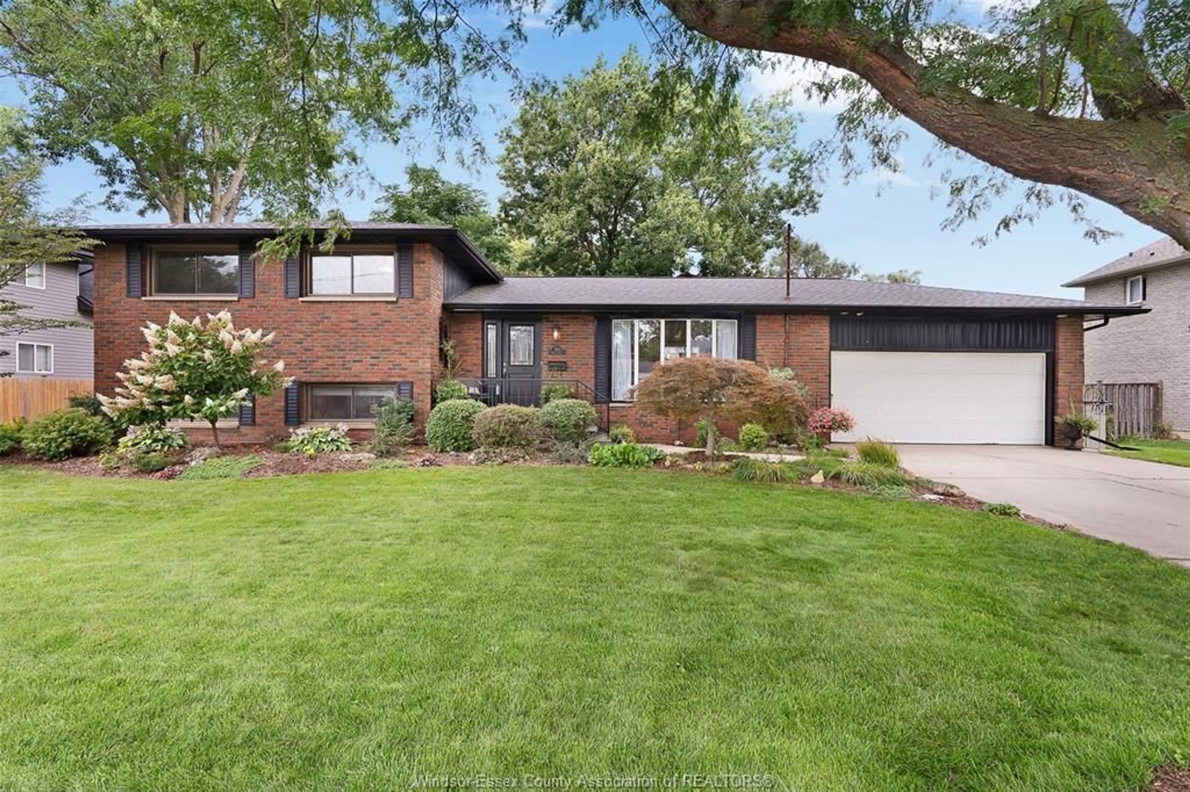 Home with brick exterior material, street for 500 Bartlet Dr, Windsor Ontario N9G 1V2