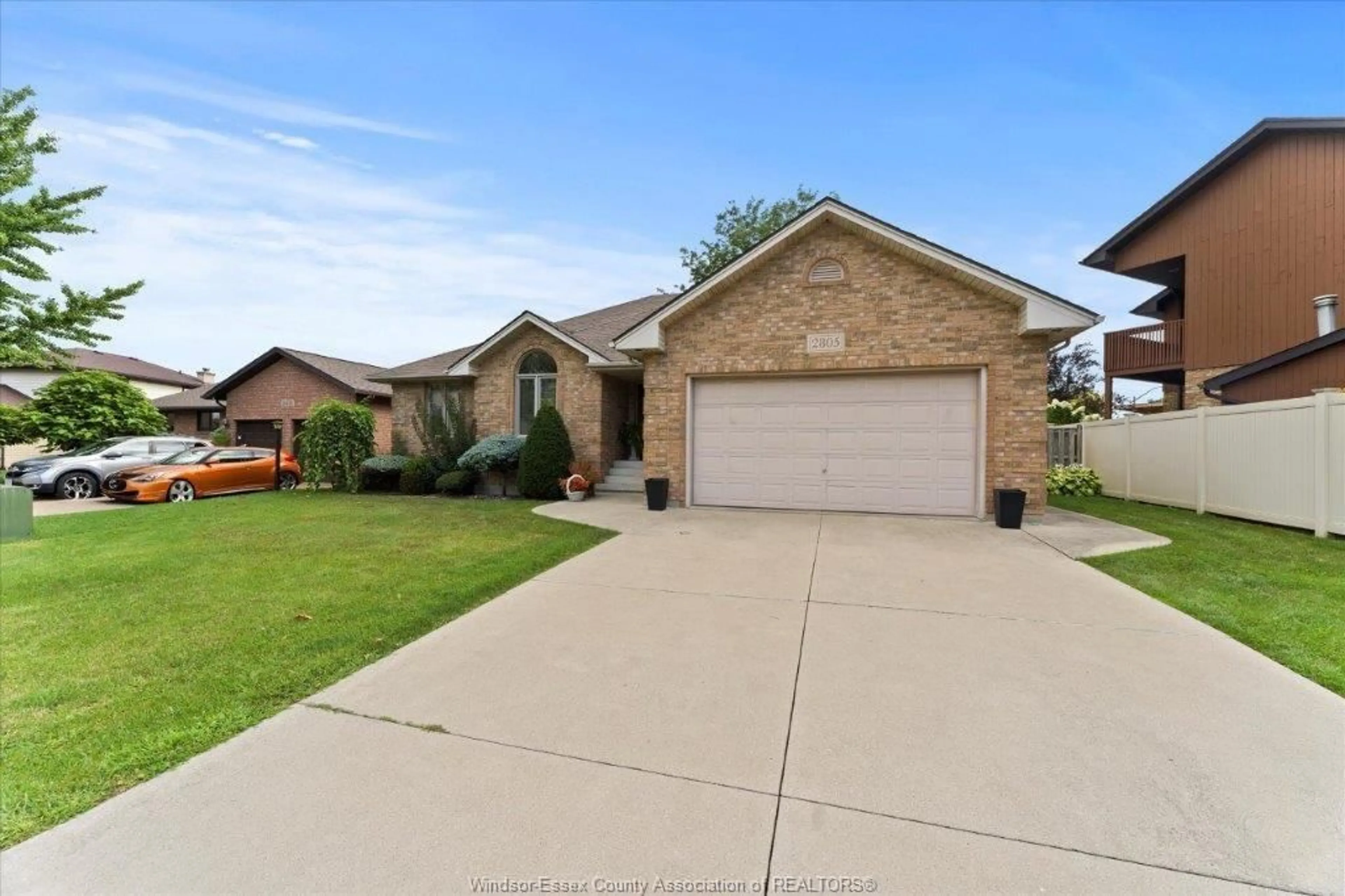 Home with brick exterior material, street for 2805 MANGIN Cres, Windsor Ontario N9E 4K6
