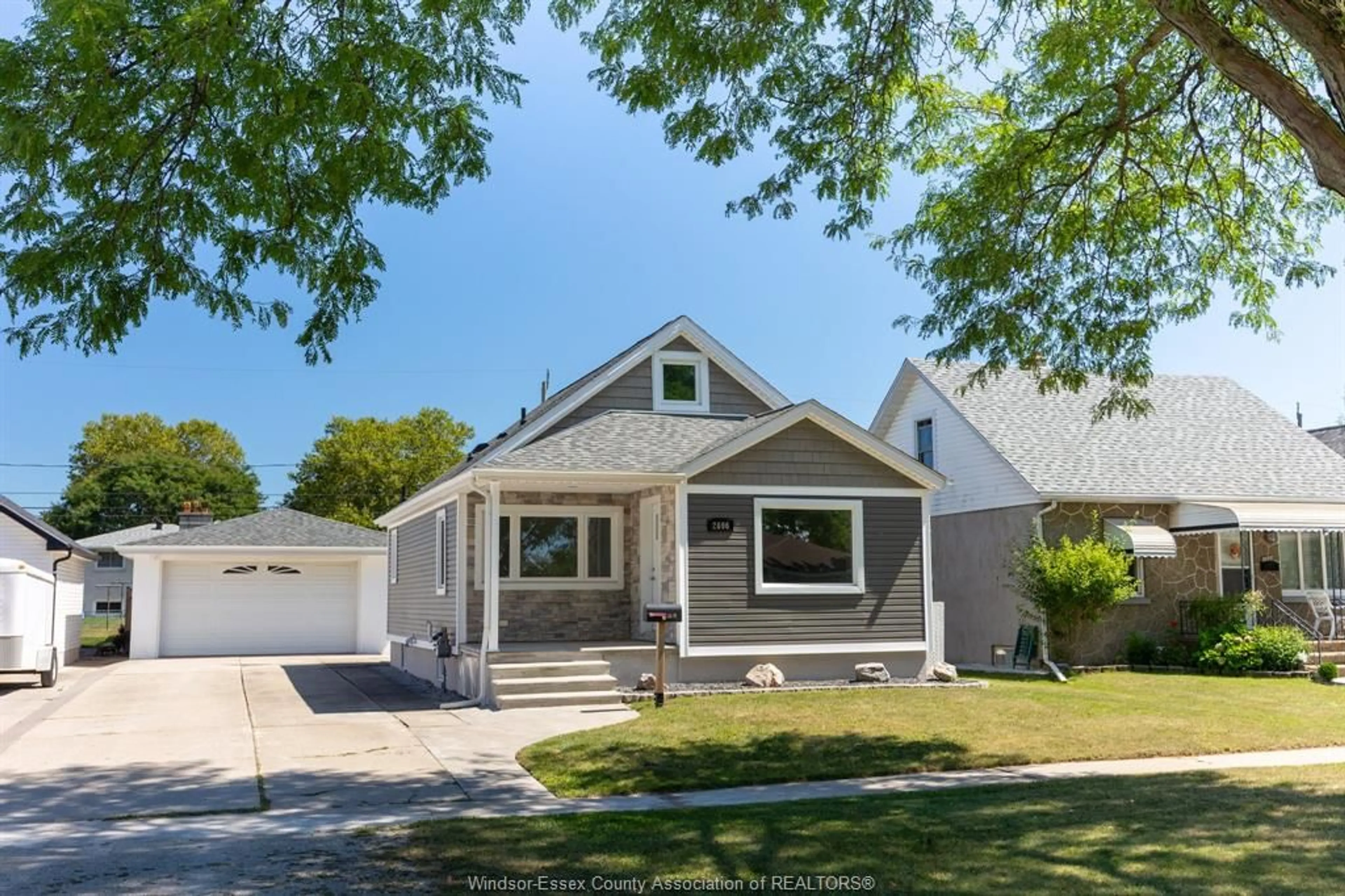 Home with vinyl exterior material, street for 2696 PARENT Ave, Windsor Ontario N8X 4K8