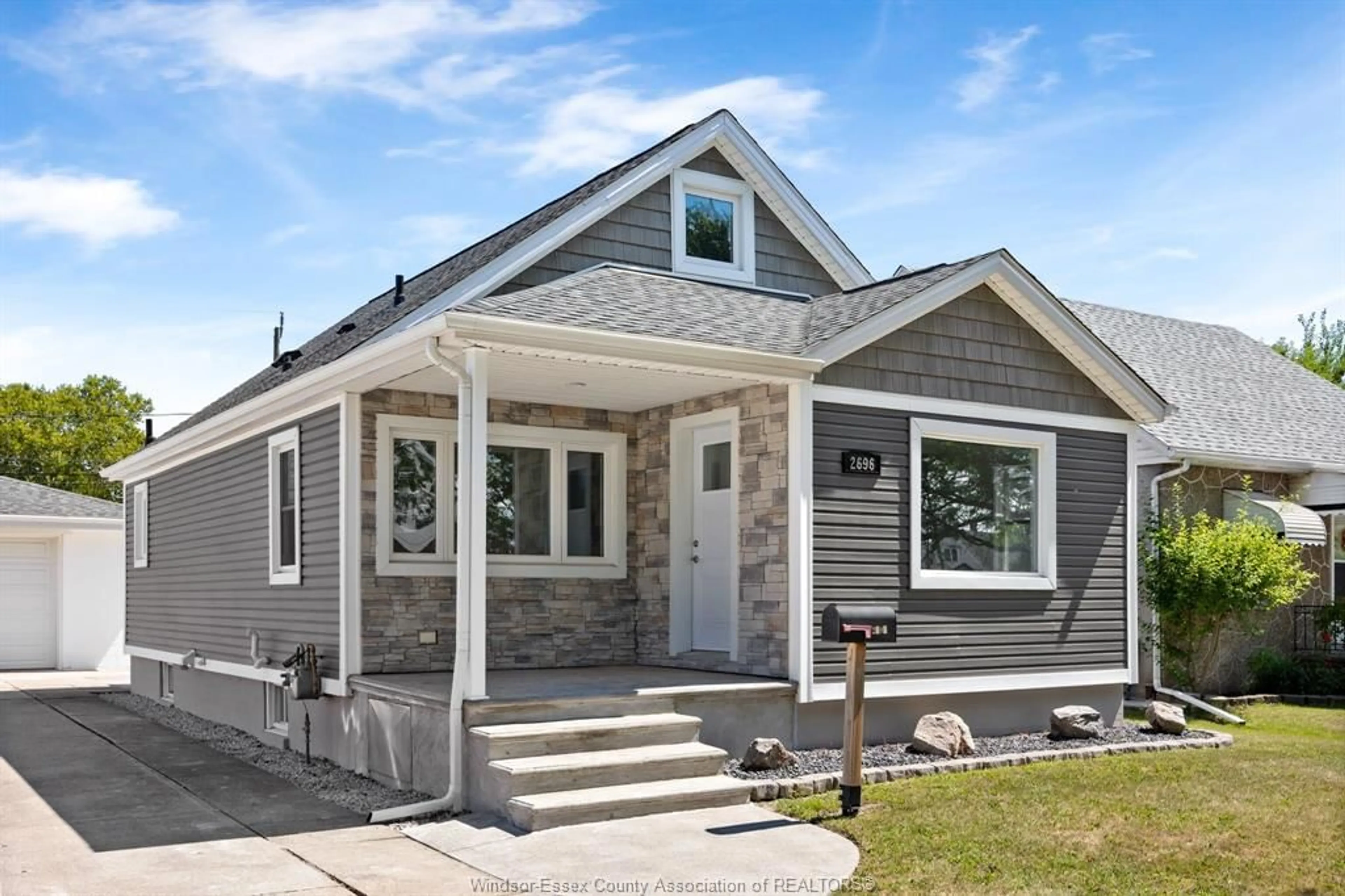 Home with vinyl exterior material, street for 2696 PARENT Ave, Windsor Ontario N8X 4K8