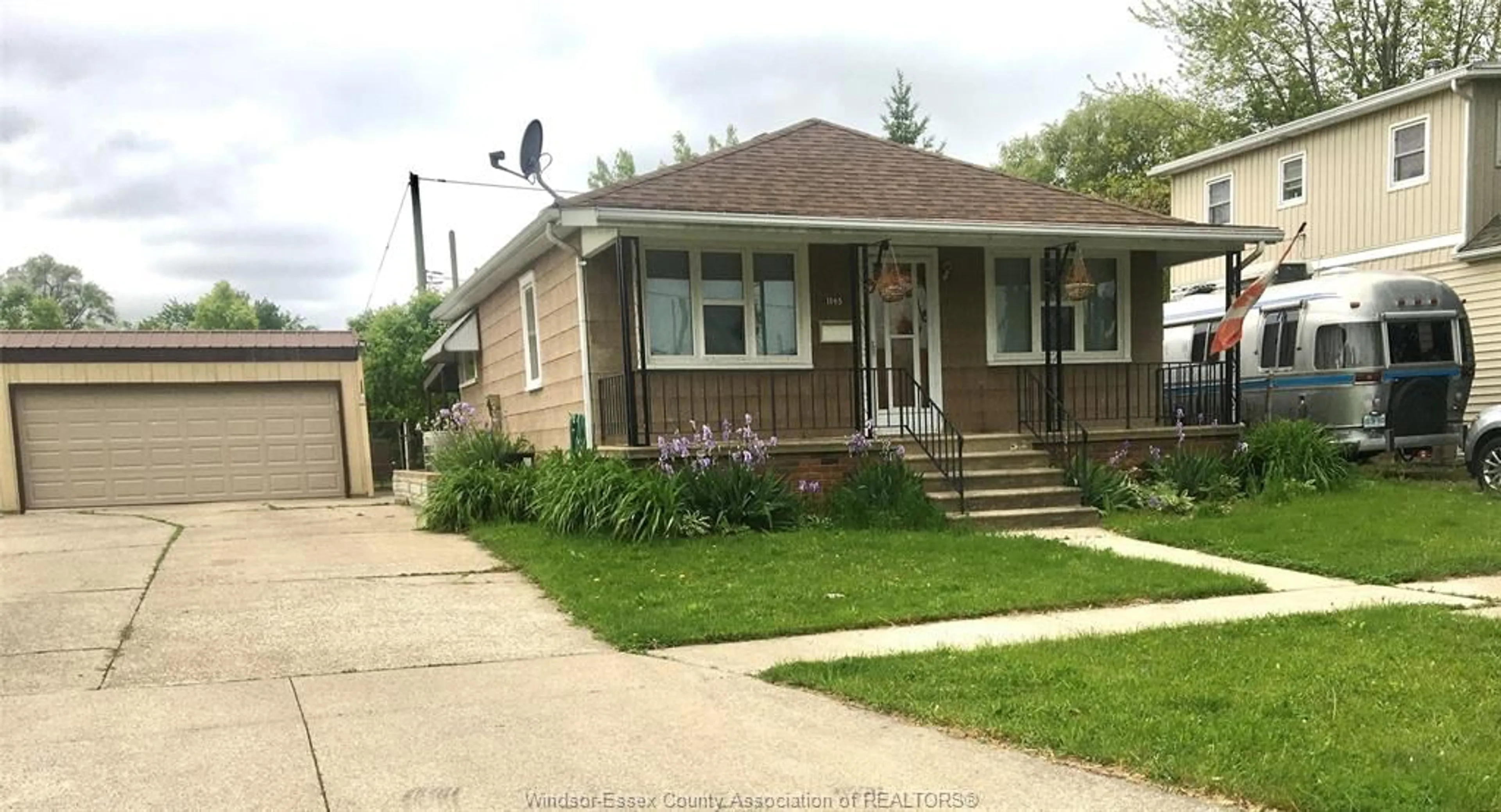 Home with brick exterior material, street for 1145 FORD Blvd, Windsor Ontario N8S 2G2