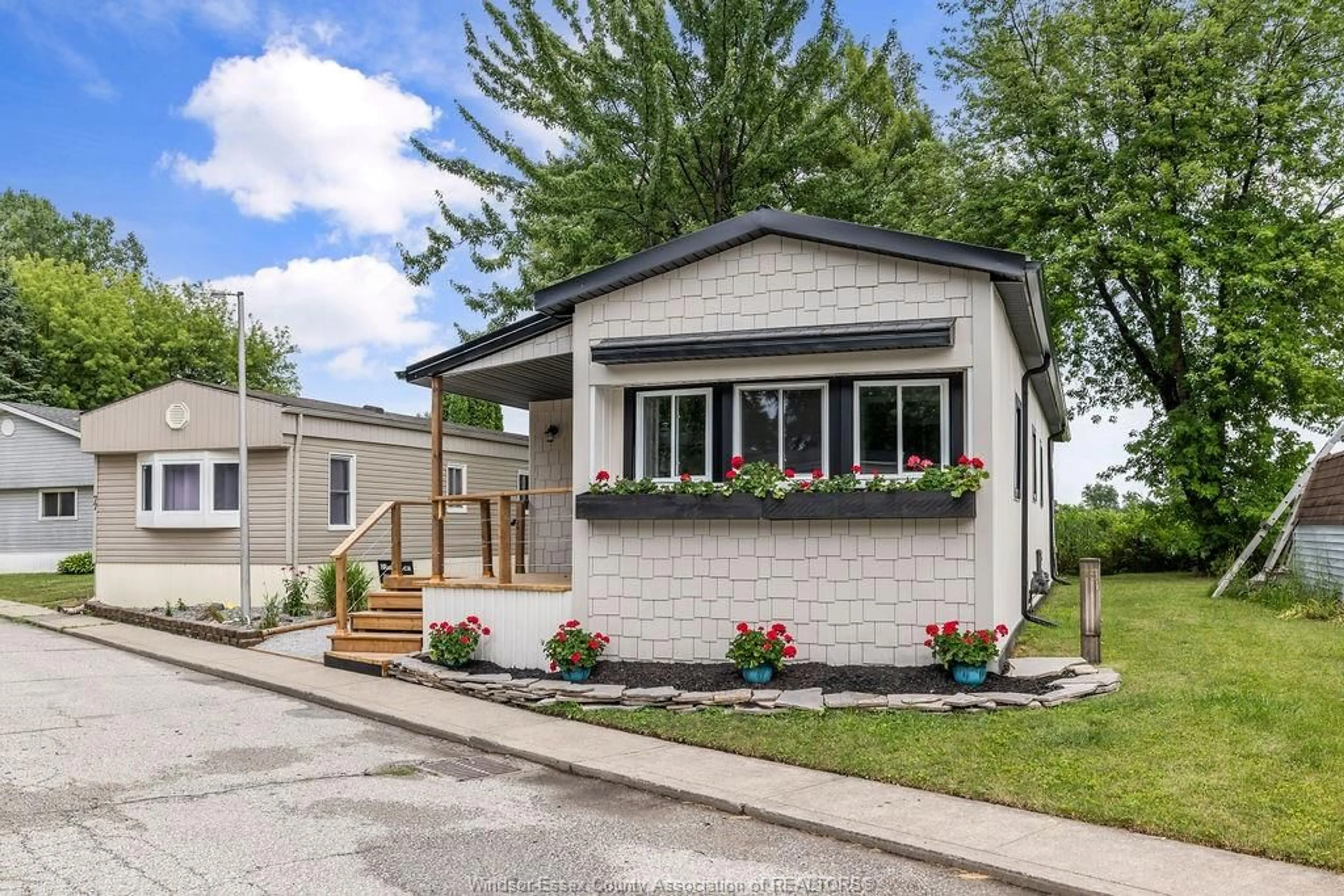 Home with vinyl exterior material, street for 75 WILDER, Lakeshore Ontario N8N 2T2
