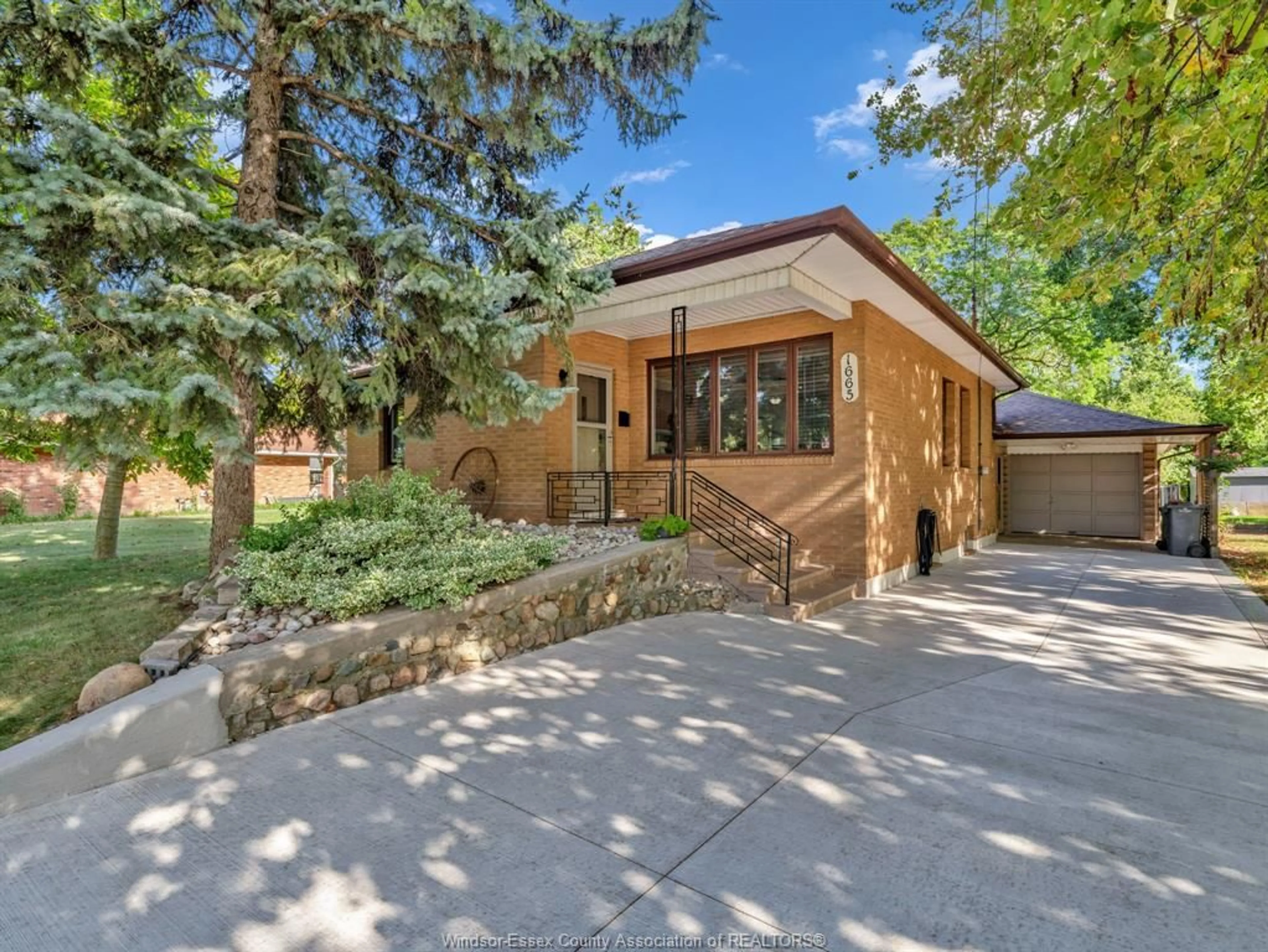 Home with brick exterior material, street for 1665 GRAND MARAIS, Windsor Ontario N8W 1W3
