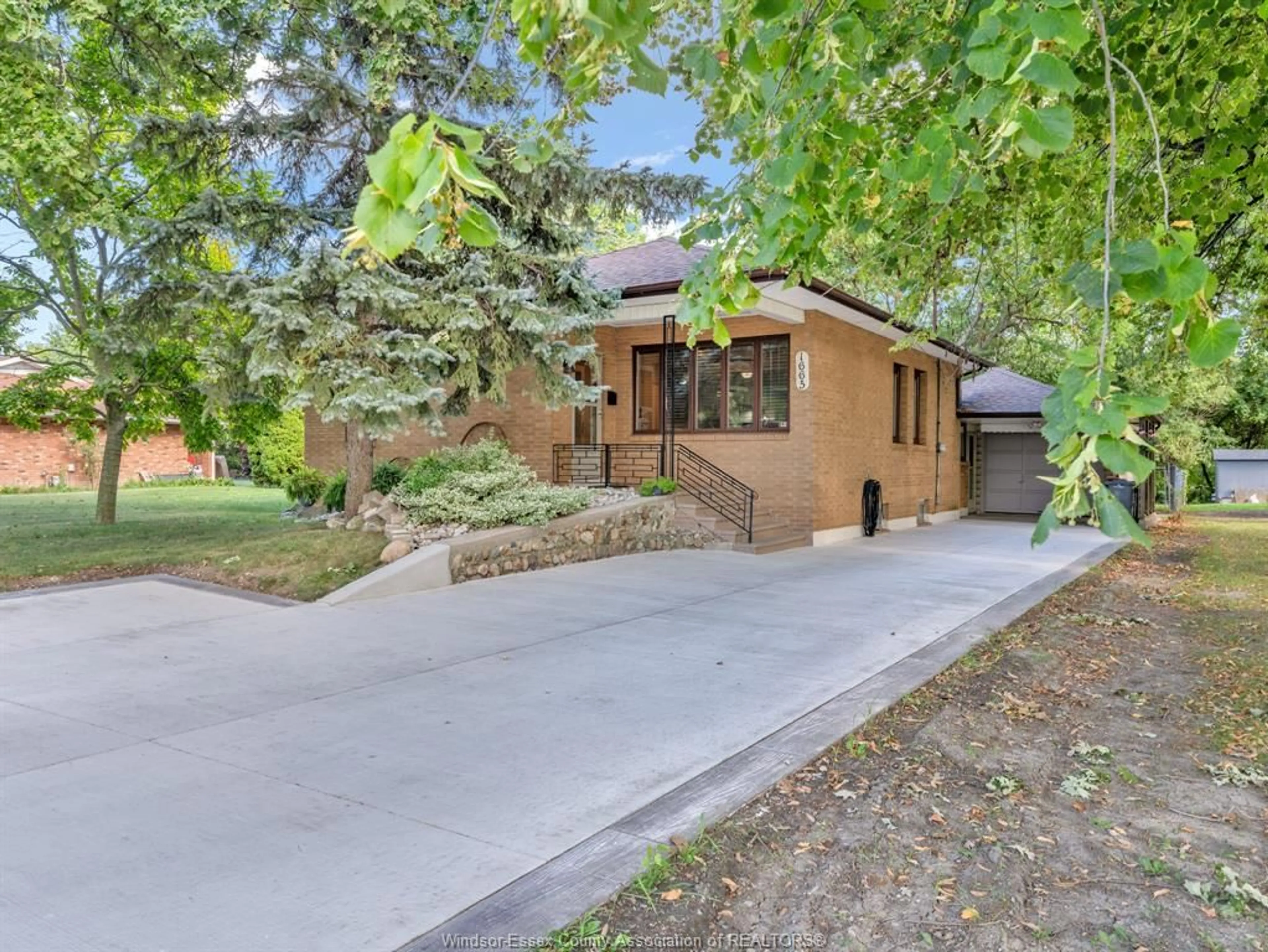 Home with brick exterior material, street for 1665 GRAND MARAIS, Windsor Ontario N8W 1W3