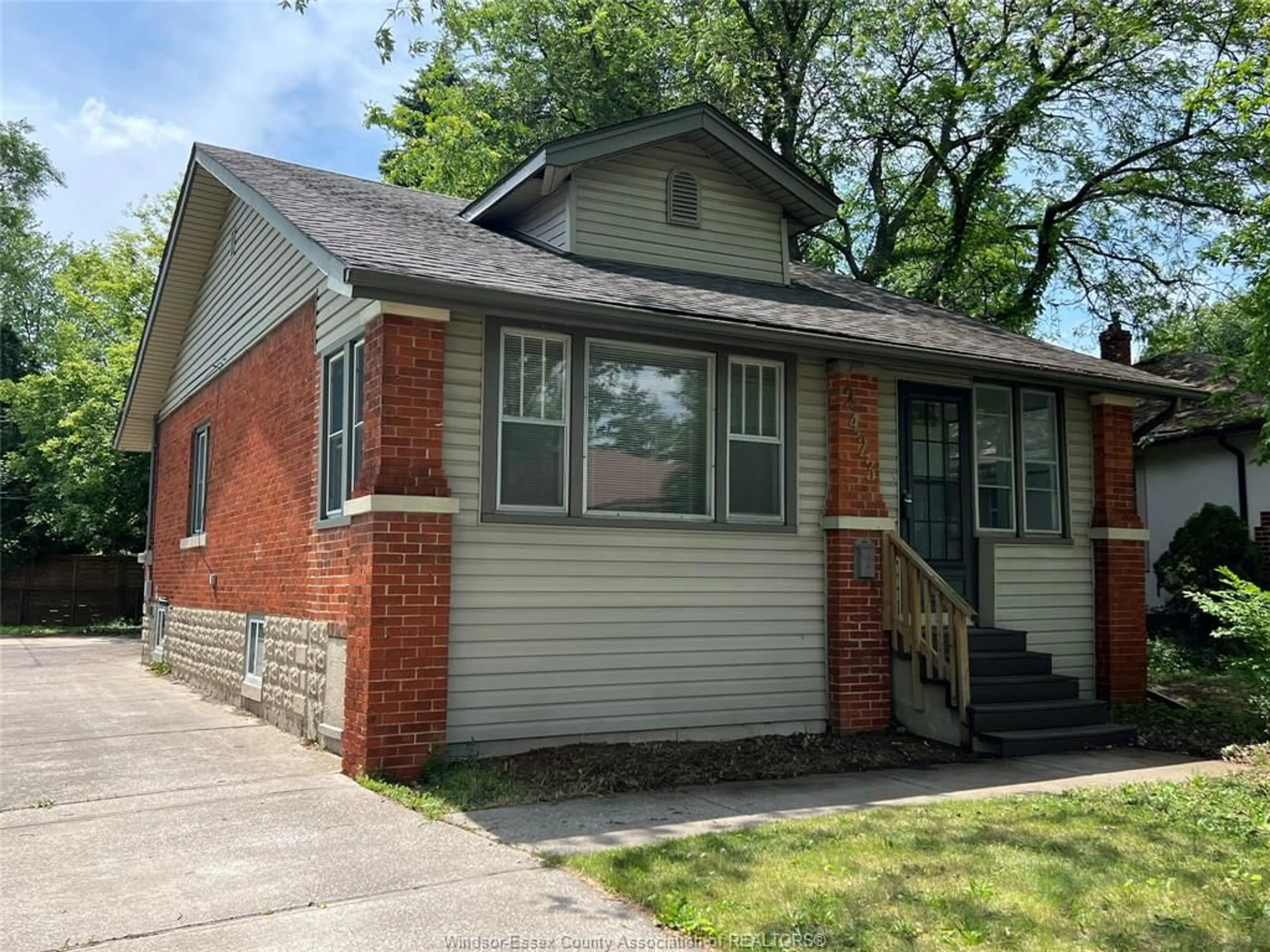 Home with brick exterior material, street for 2423 PRINCESS Ave, Windsor Ontario N8T 1V2