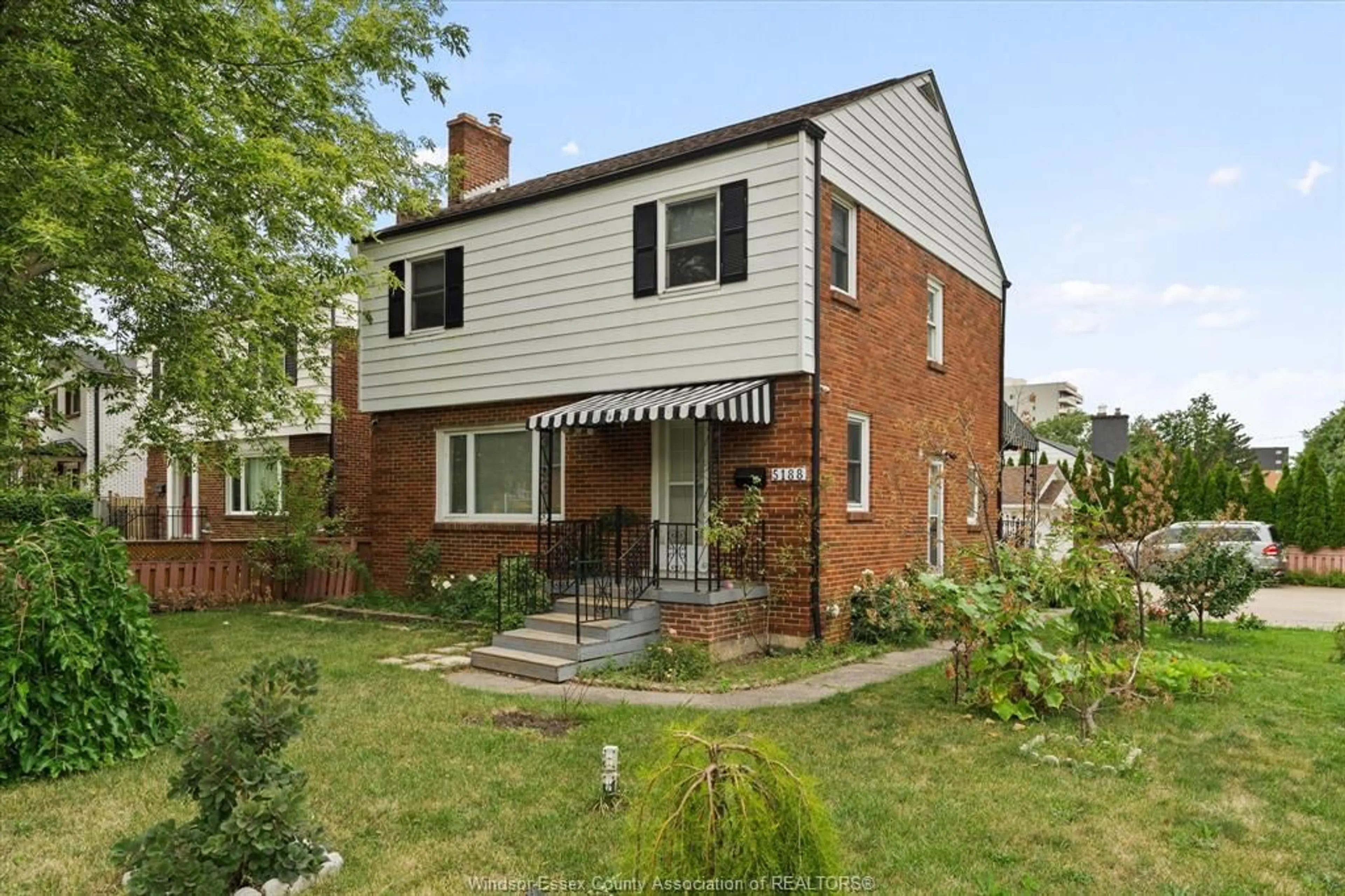 Home with brick exterior material, street for 5188 WYANDOTTE St, Windsor Ontario N8S 1L2