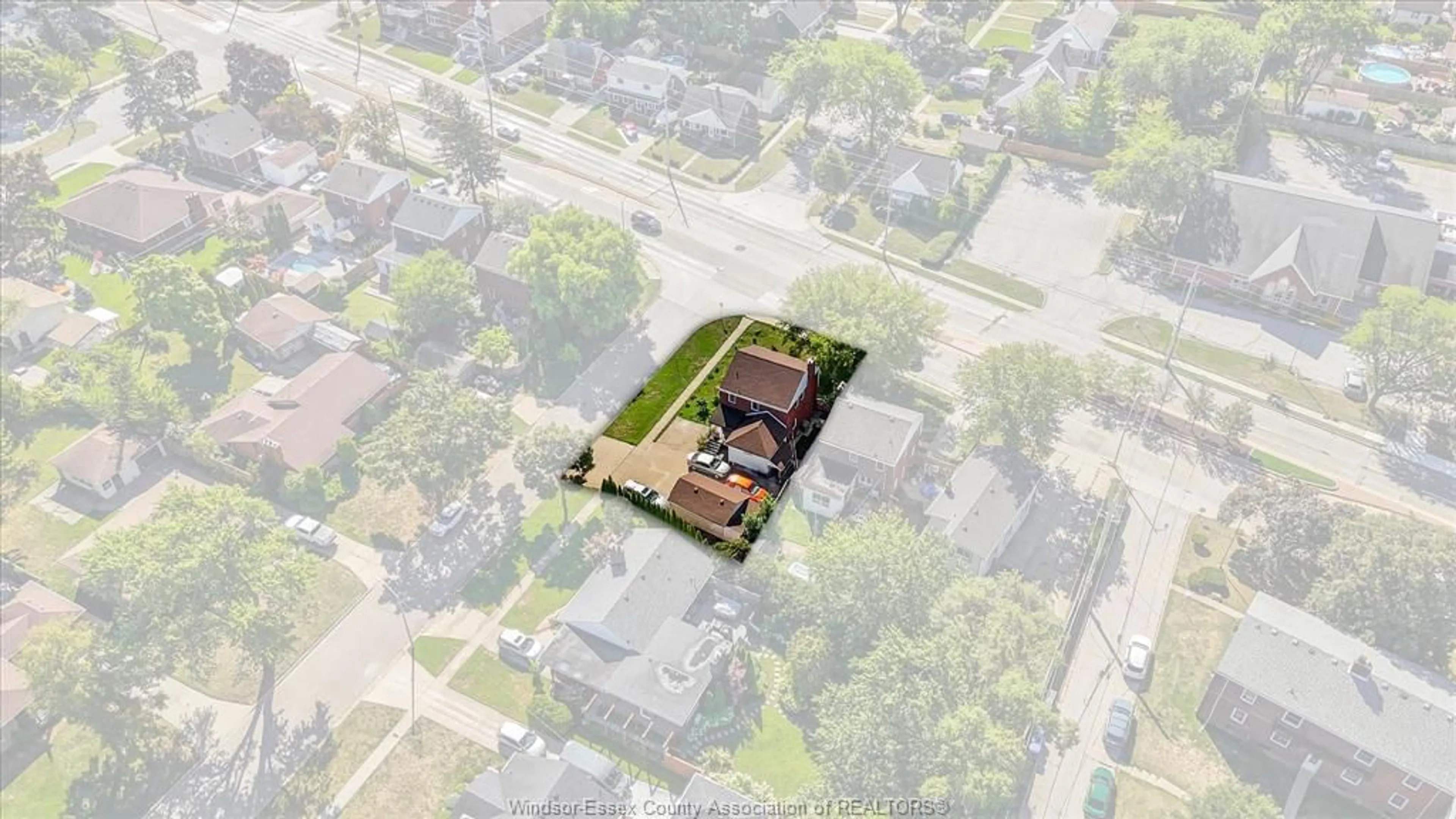 A pic from outside/outdoor area/front of a property/back of a property/a pic from drone, street for 5188 WYANDOTTE St, Windsor Ontario N8S 1L2