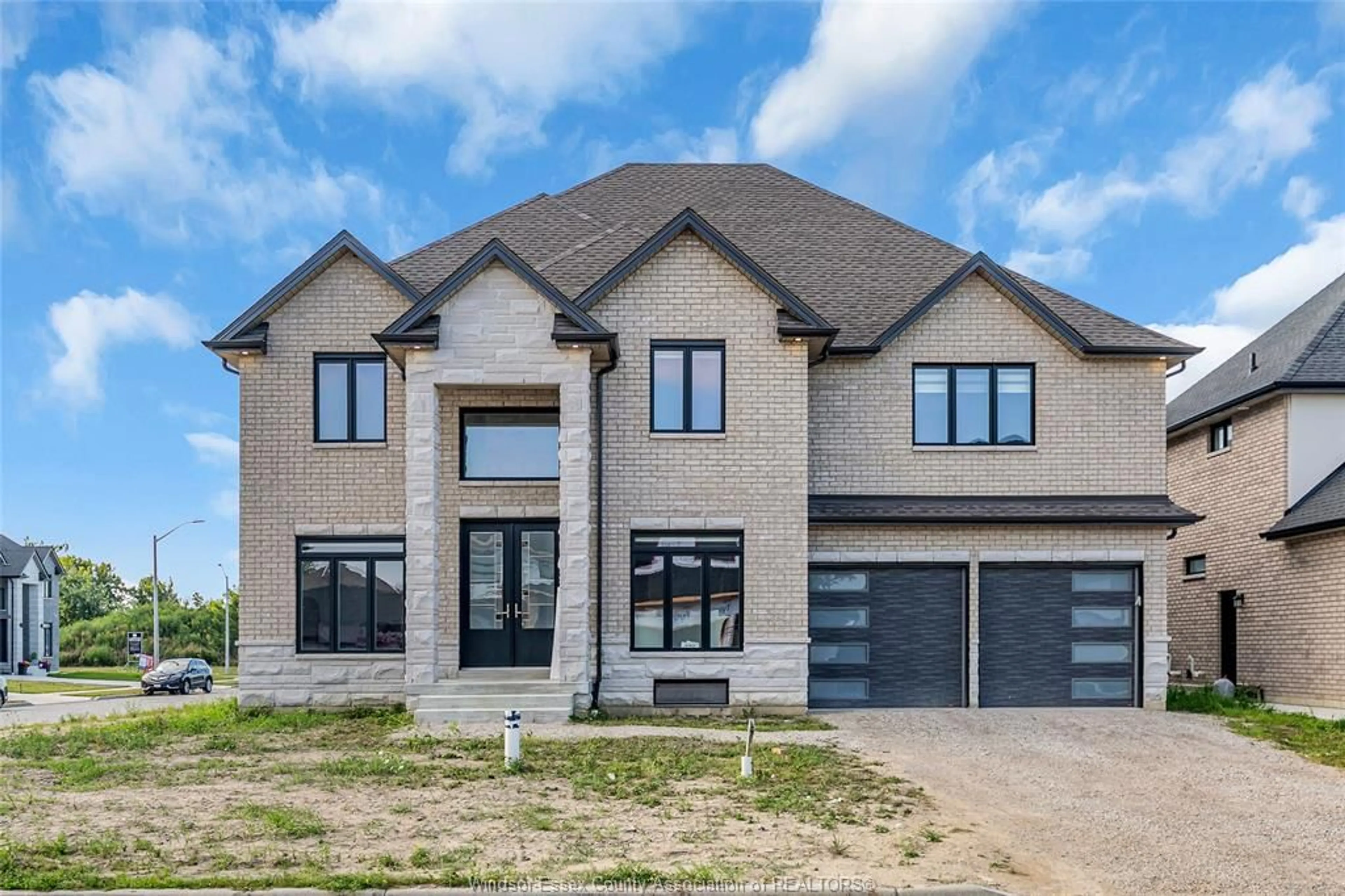 Home with brick exterior material, street for 570 ORCHARD Cres, Windsor Ontario N9E 0B2