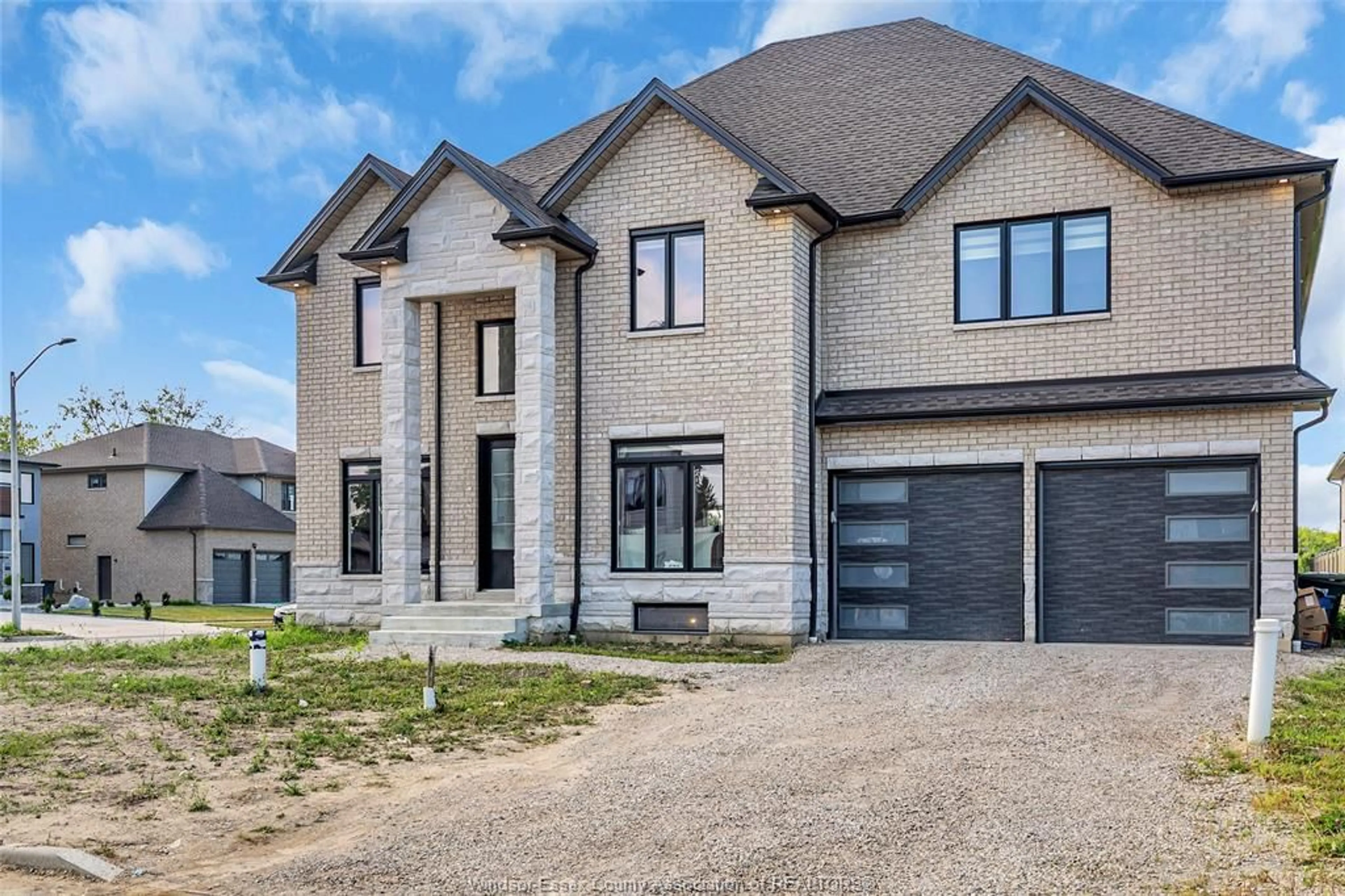 Home with brick exterior material, street for 570 ORCHARD Cres, Windsor Ontario N9E 0B2