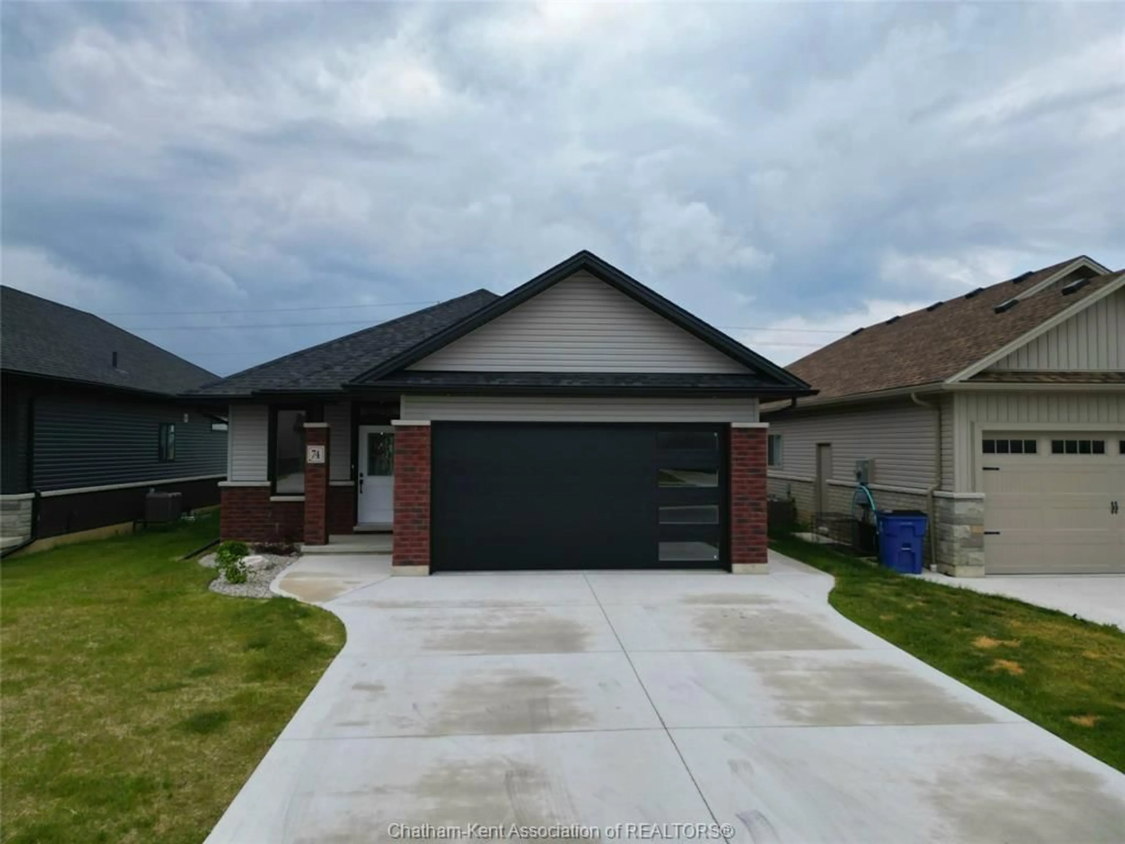 Home with brick exterior material, street for 74 EVENING Dr, Chatham Ontario N7L 0B6