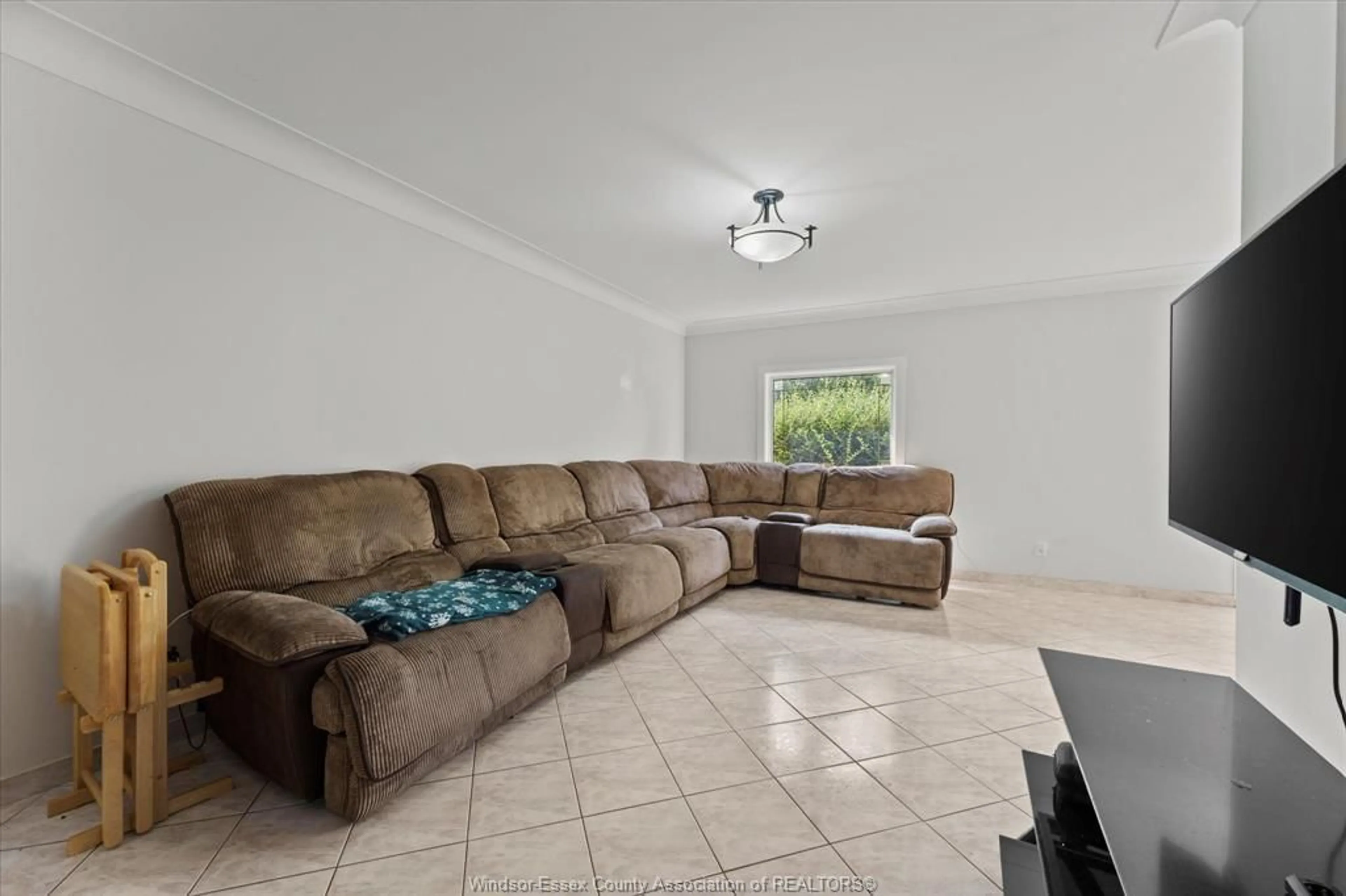 Living room with furniture, unknown for 10540 Halstead Cres, Windsor Ontario N8R 2C4