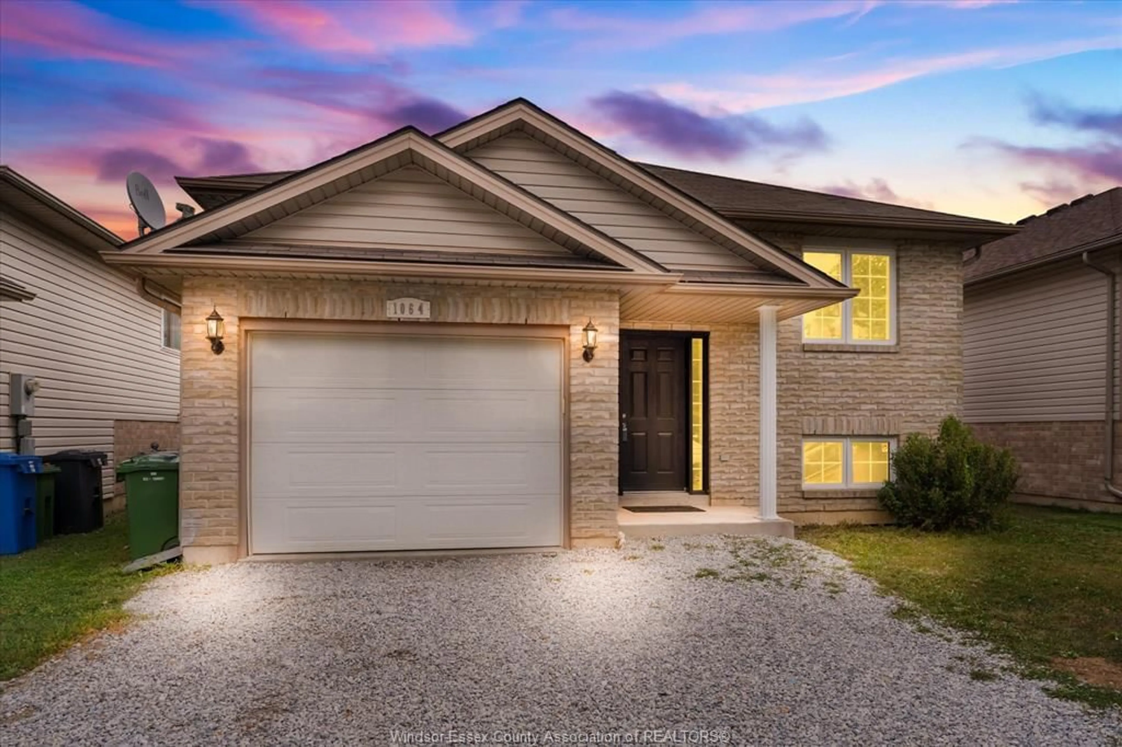 Home with brick exterior material, street for 1064 PEARSON Ave, Windsor Ontario N8P 1Y6