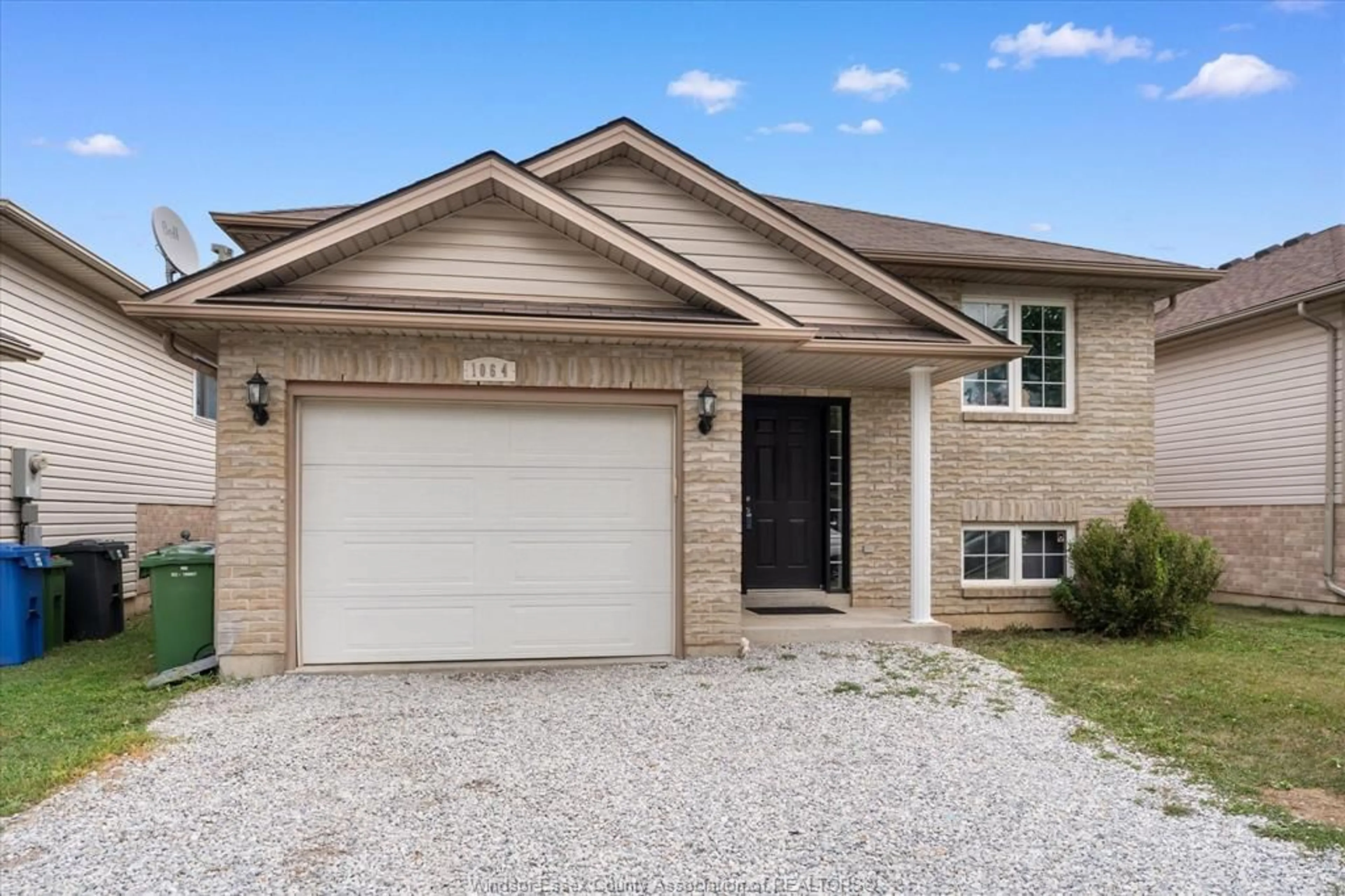 Home with brick exterior material, street for 1064 PEARSON Ave, Windsor Ontario N8P 1Y6