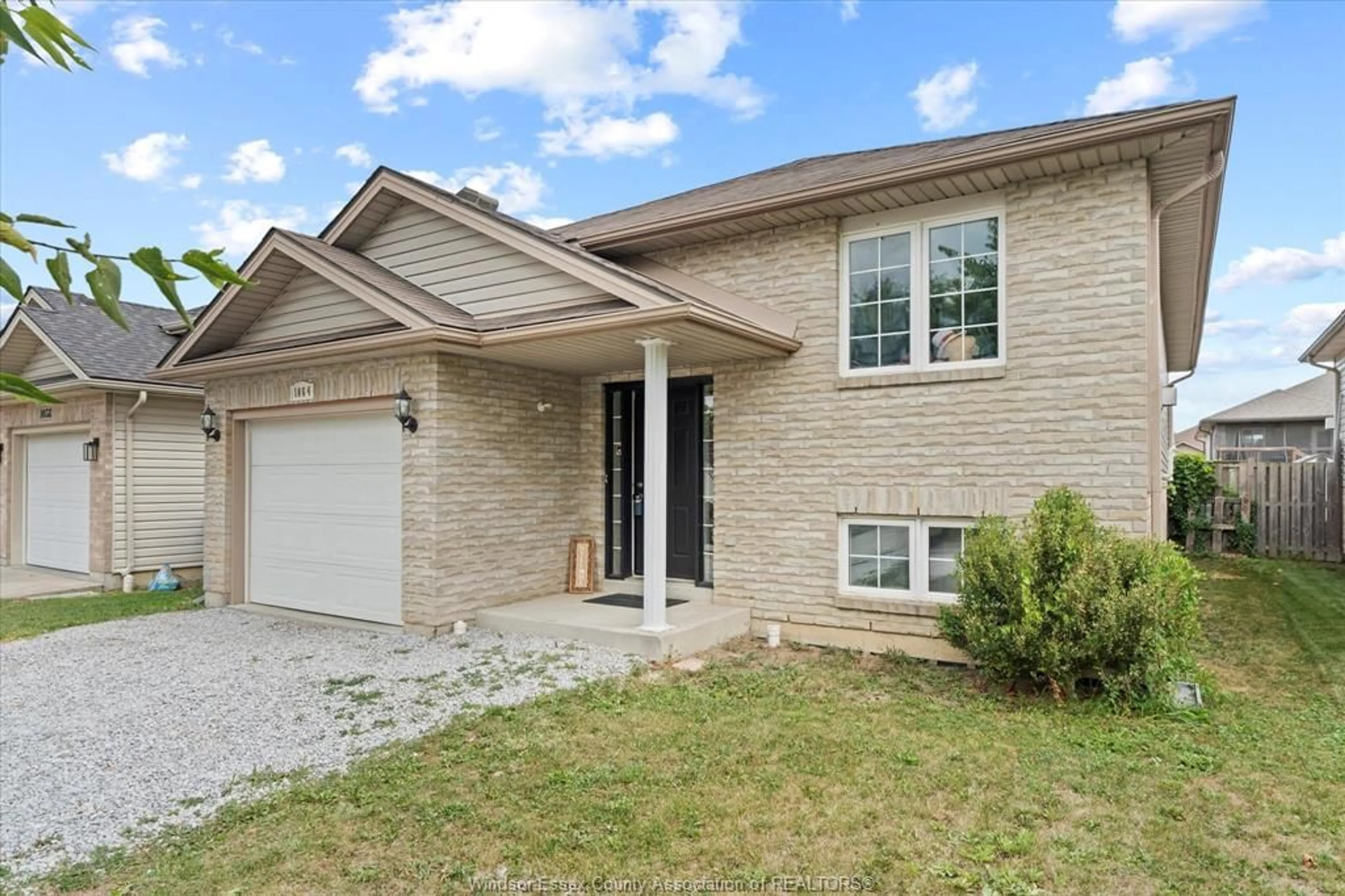 Home with brick exterior material, street for 1064 PEARSON Ave, Windsor Ontario N8P 1Y6