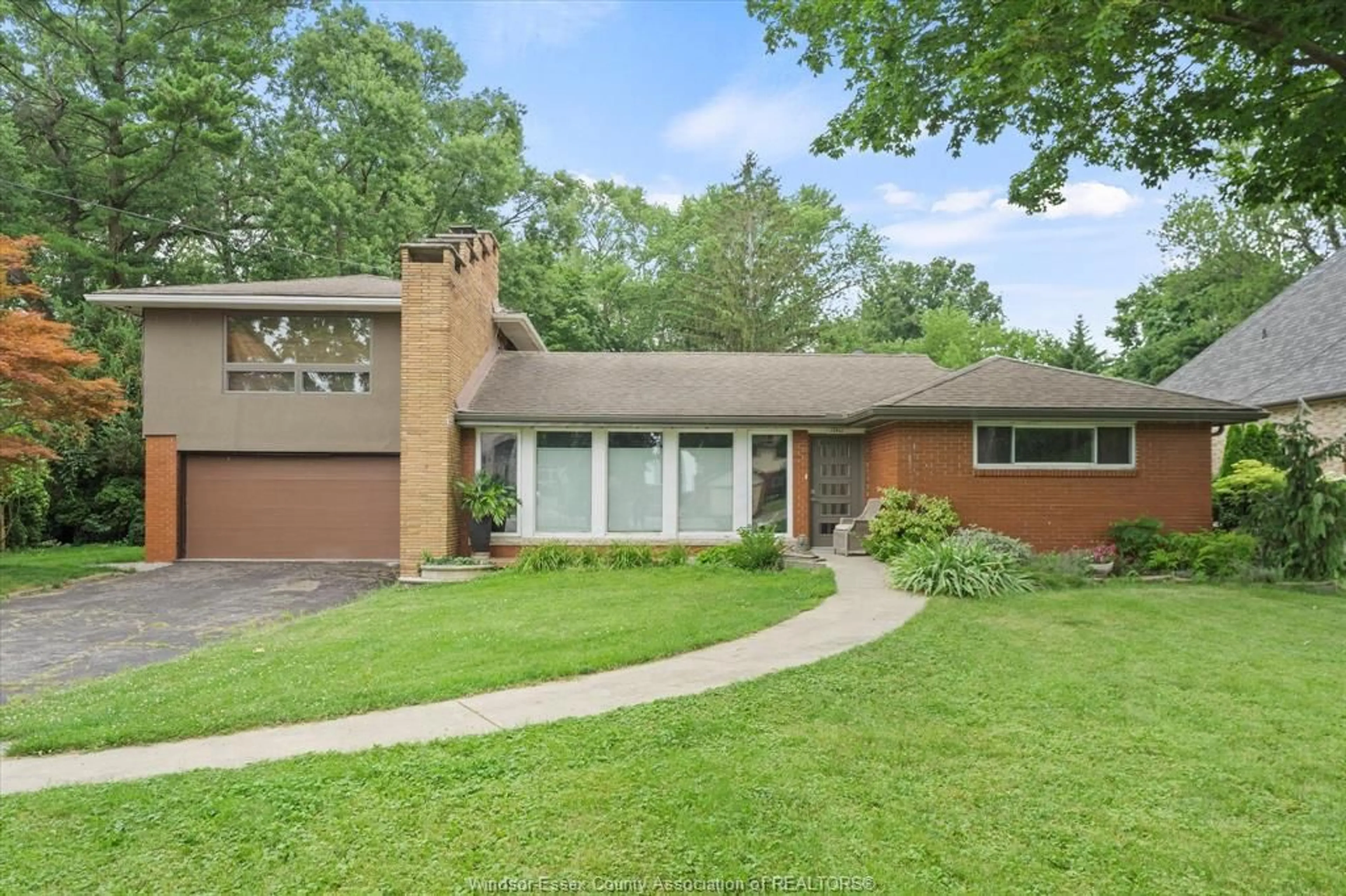 Home with brick exterior material, street for 13961 RIVERSIDE Dr, Tecumseh Ontario N8N 1B7