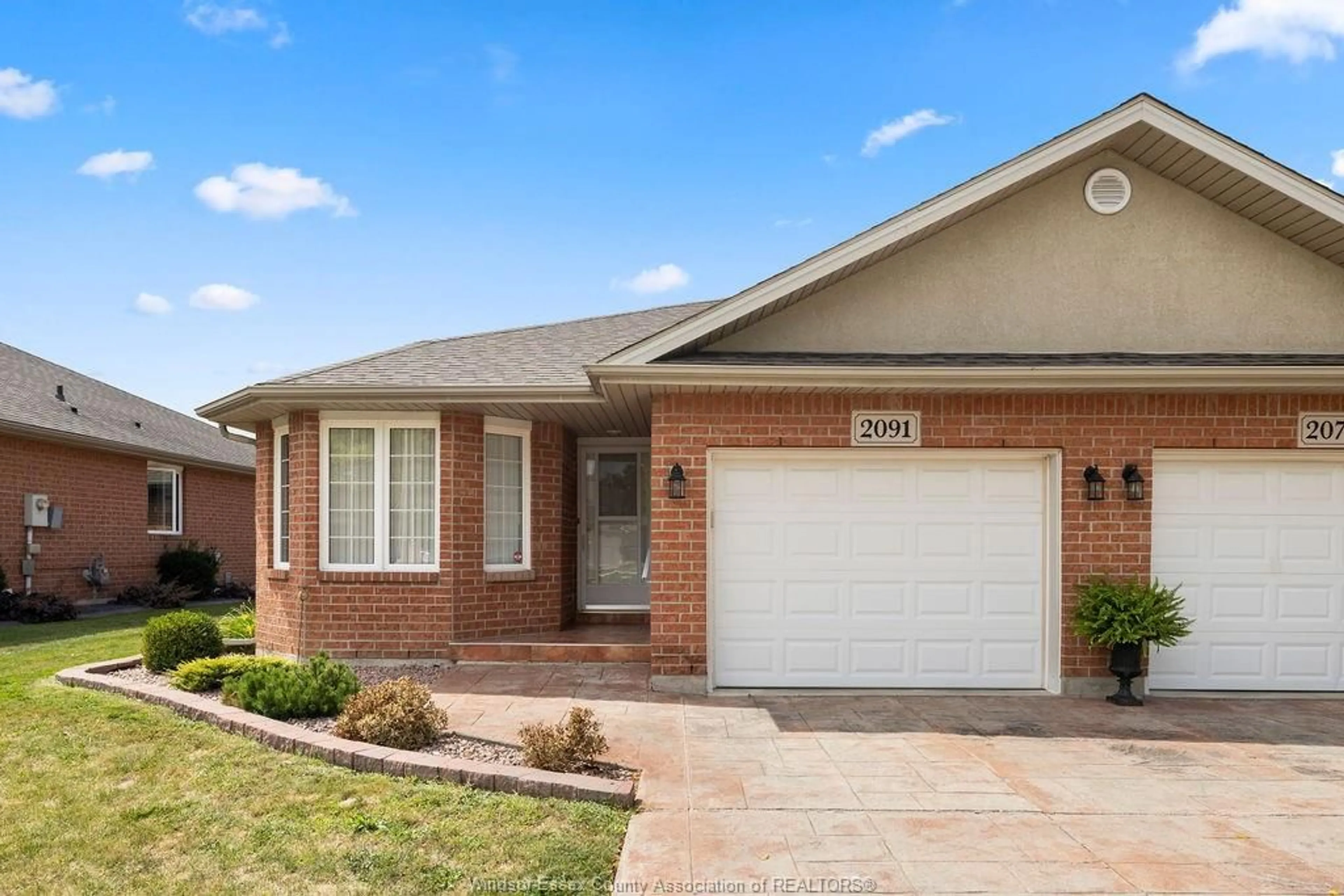 Home with brick exterior material, street for 2091 QUESTA, Windsor Ontario N8P 1N8