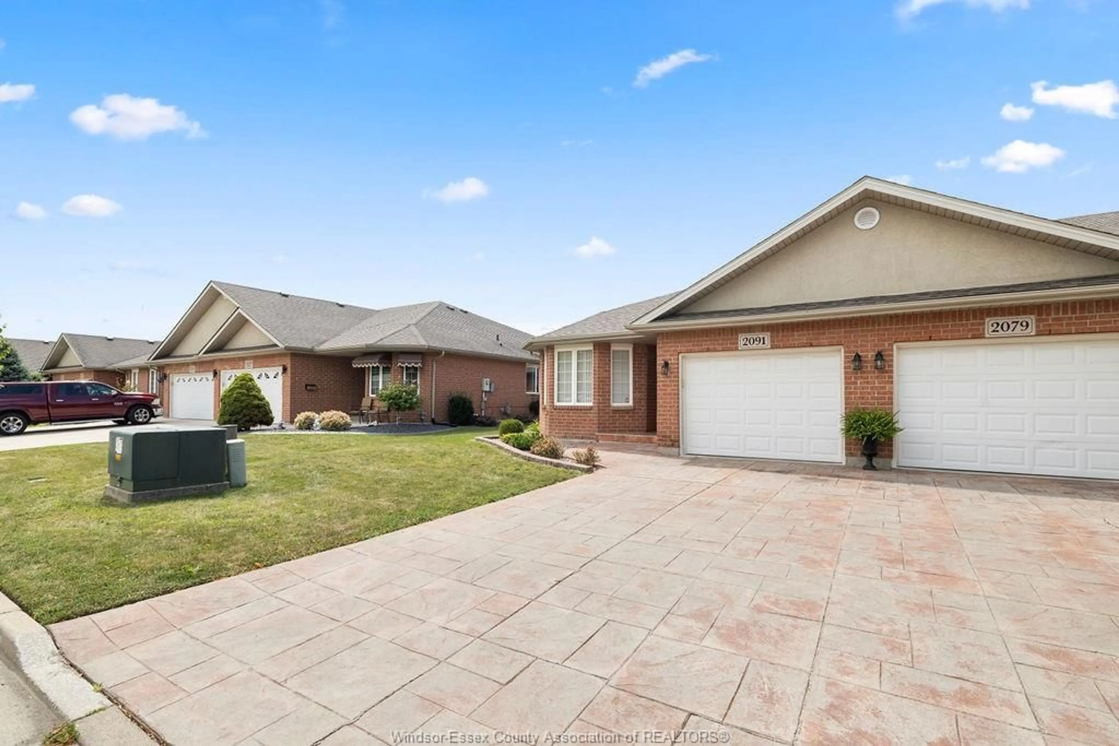 Home with brick exterior material, street for 2091 QUESTA, Windsor Ontario N8P 1N8