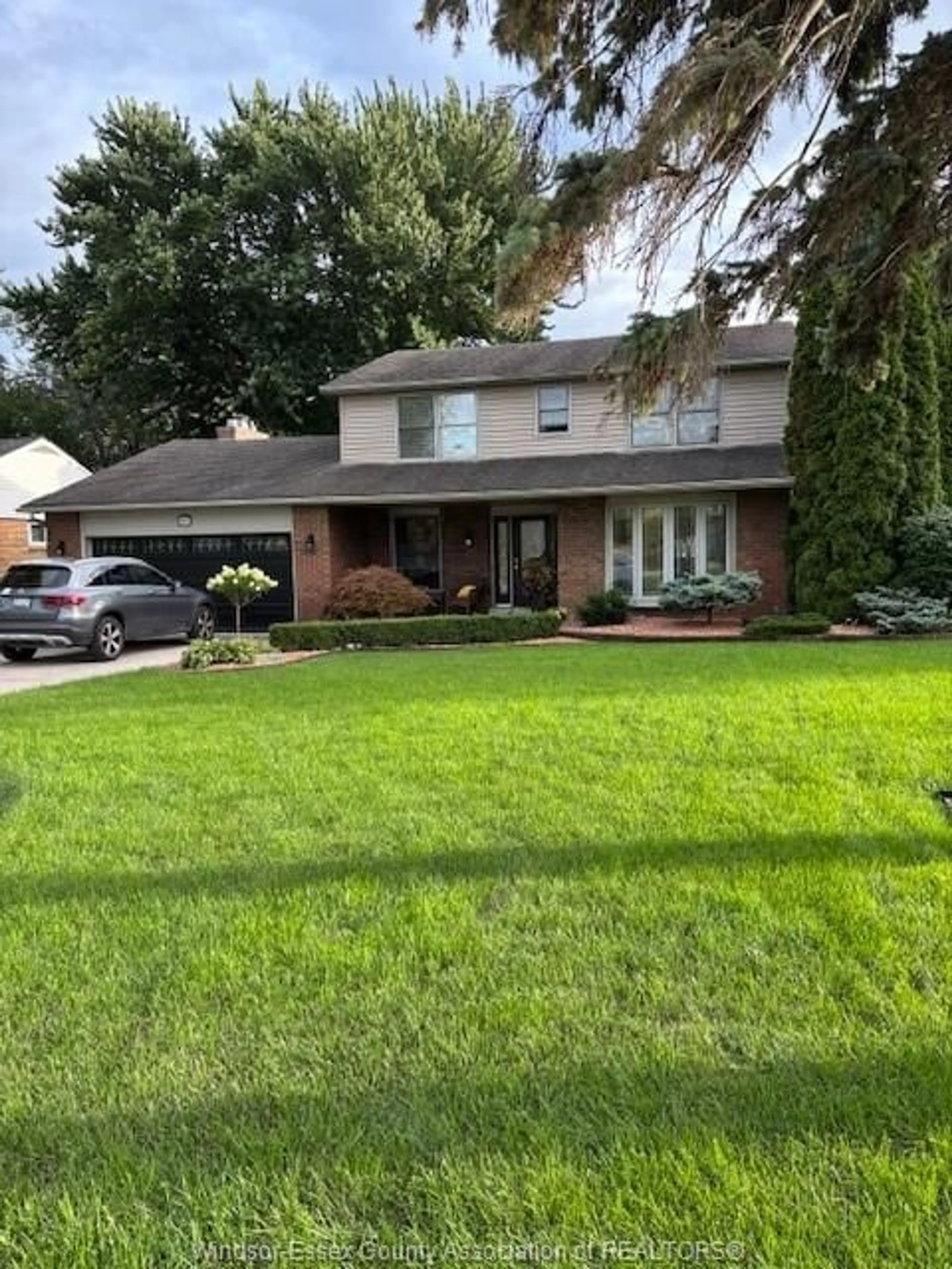 Home with brick exterior material, street for 14035 RIVERSIDE Dr, Tecumseh Ontario N8N 1B7