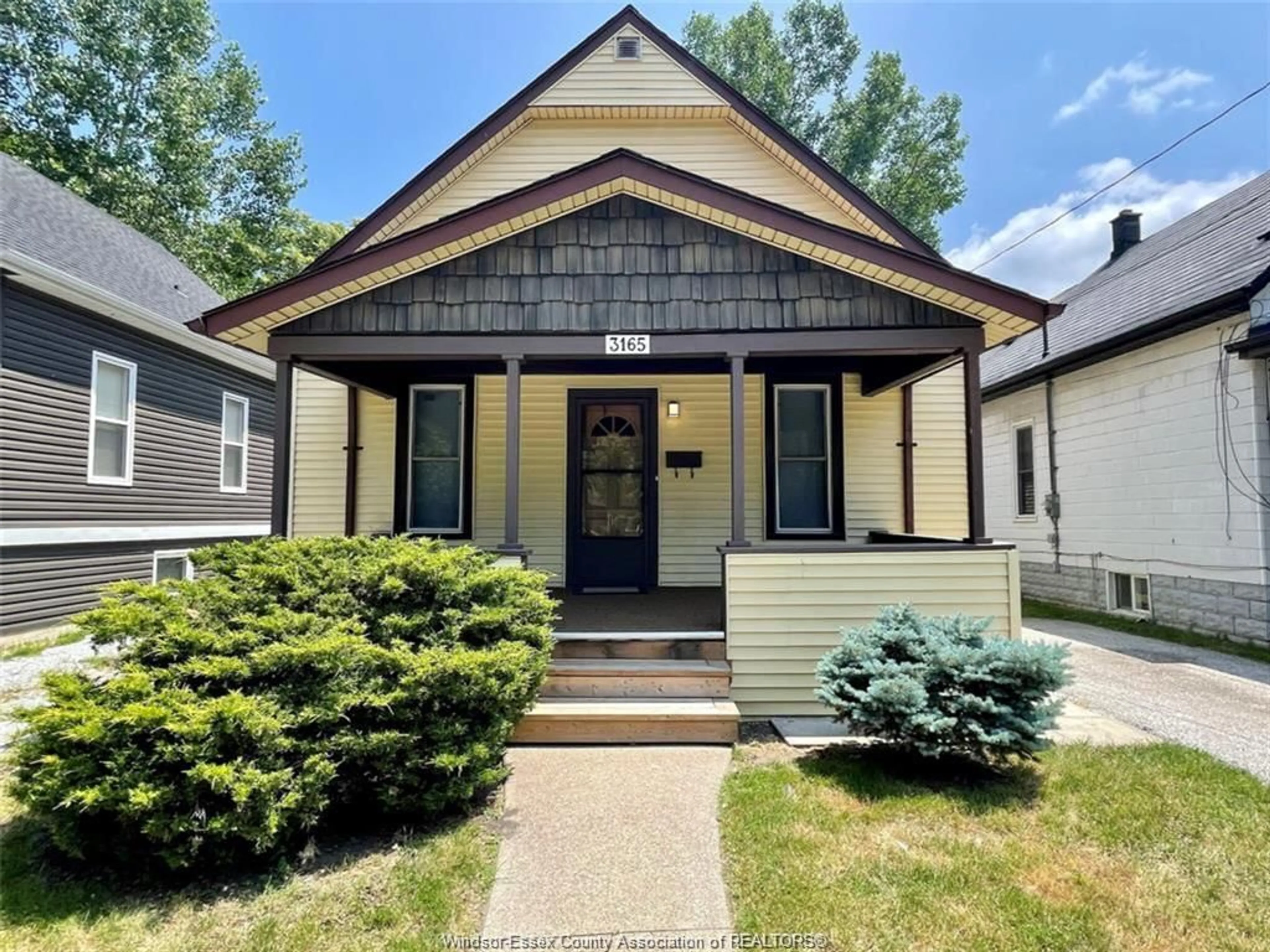 Home with vinyl exterior material, street for 3165 Peter St, Windsor Ontario N9B 2K5