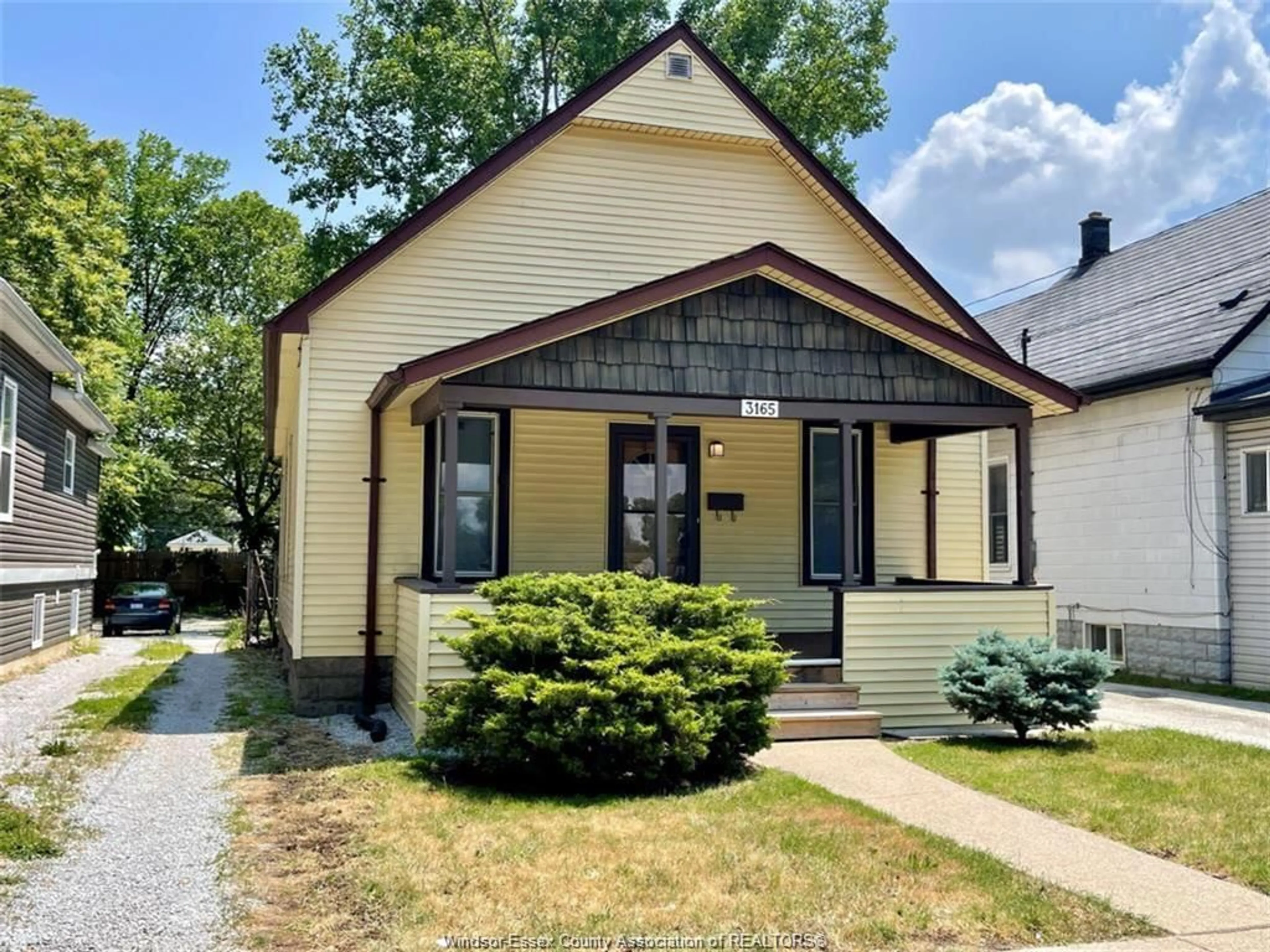 Home with vinyl exterior material, street for 3165 Peter St, Windsor Ontario N9B 2K5