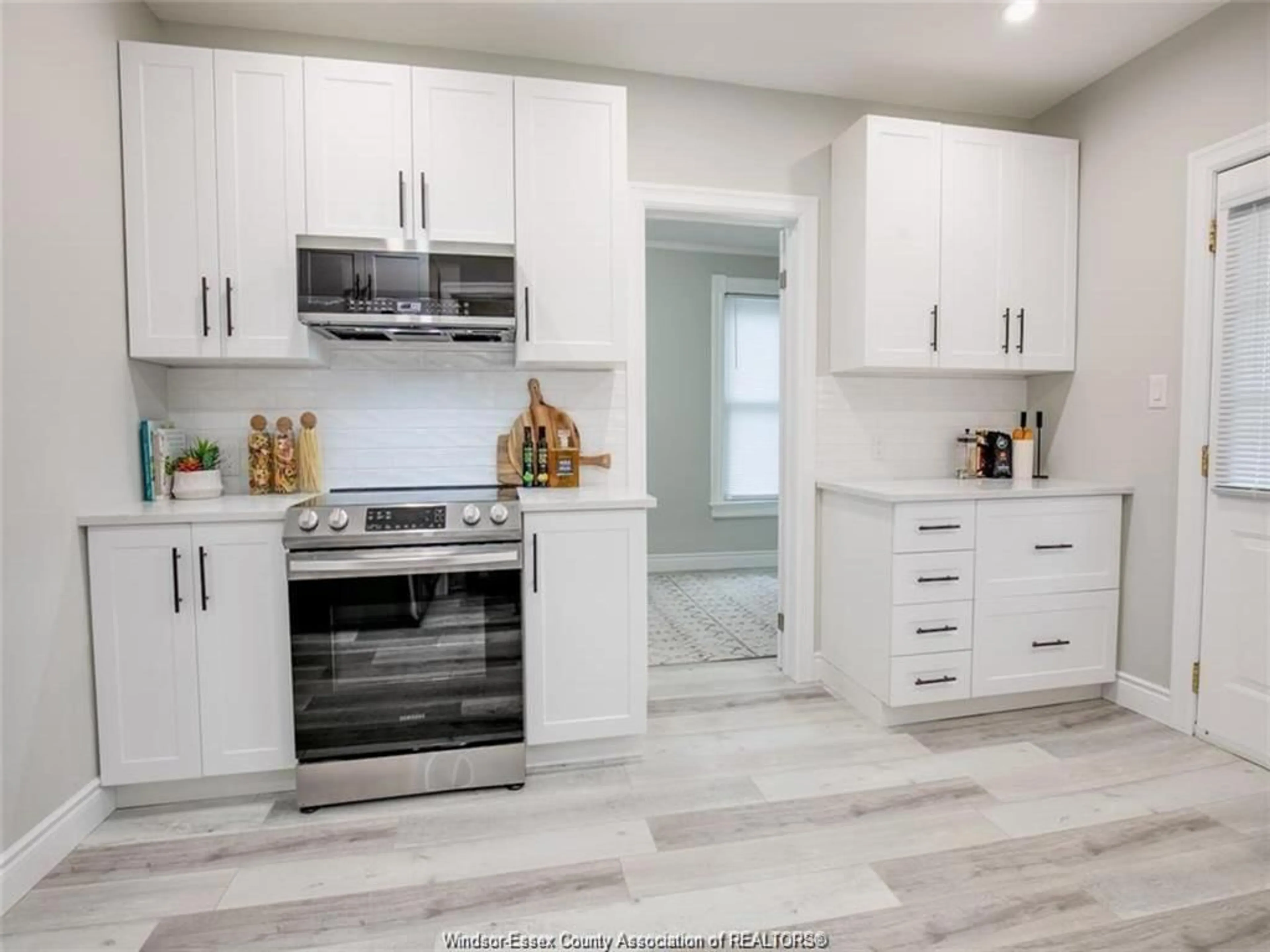 Open concept kitchen, ceramic/tile floor for 3165 Peter St, Windsor Ontario N9B 2K5