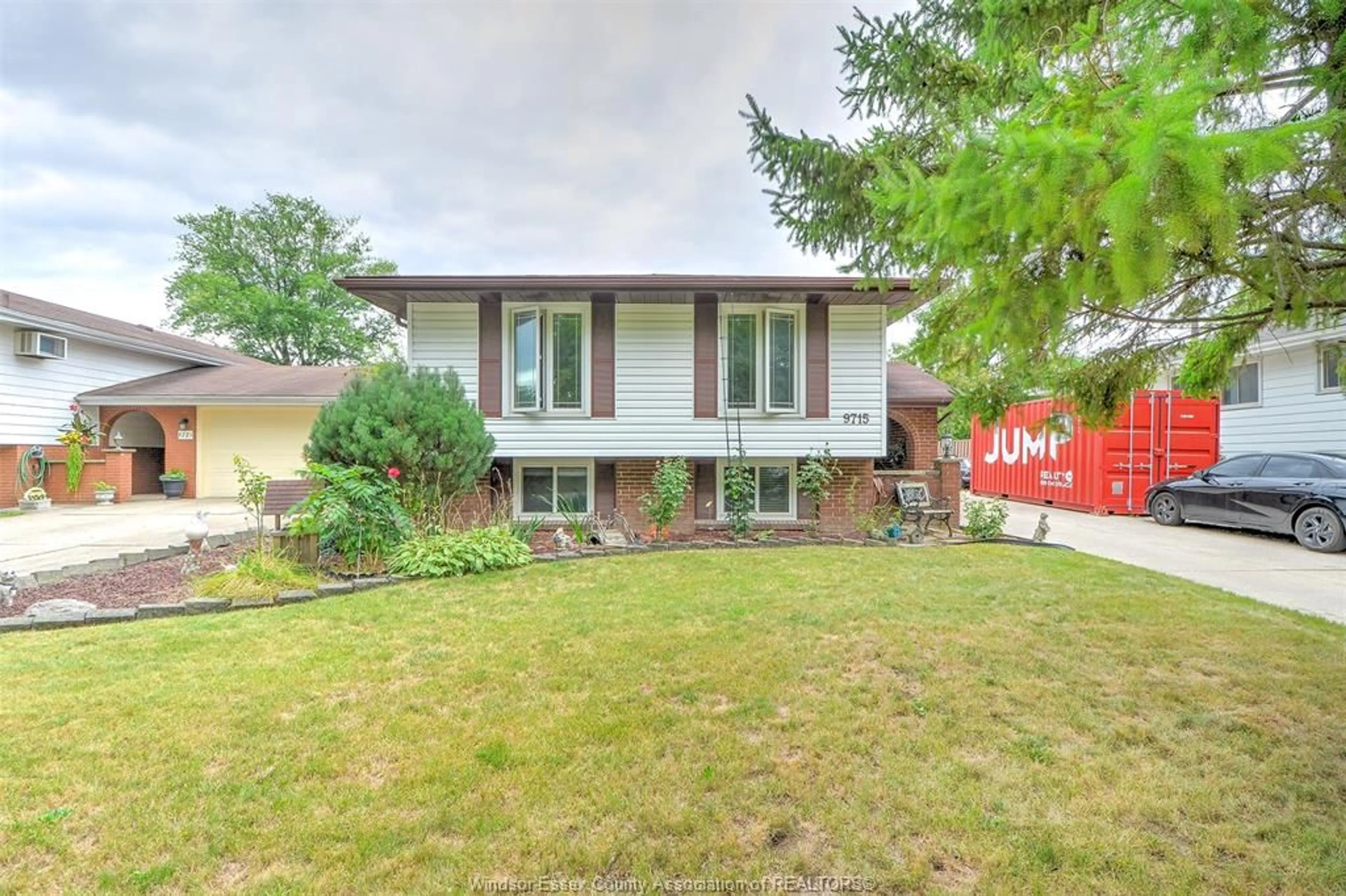Home with vinyl exterior material, street for 9715 OSBORN, Windsor Ontario N8R 1G2