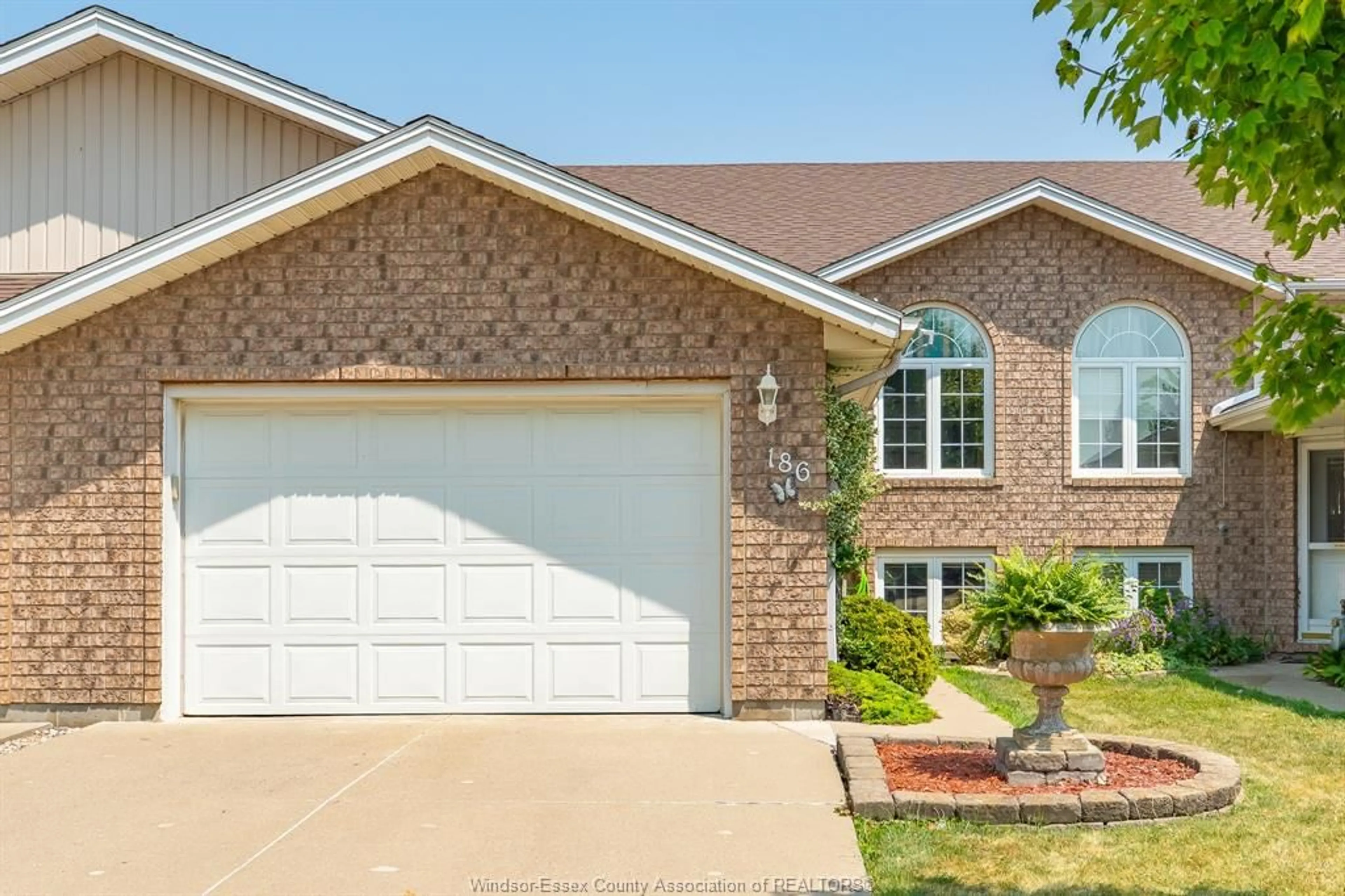 Home with brick exterior material, street for 186 Bennie Ave, Leamington Ontario N8H 5L8