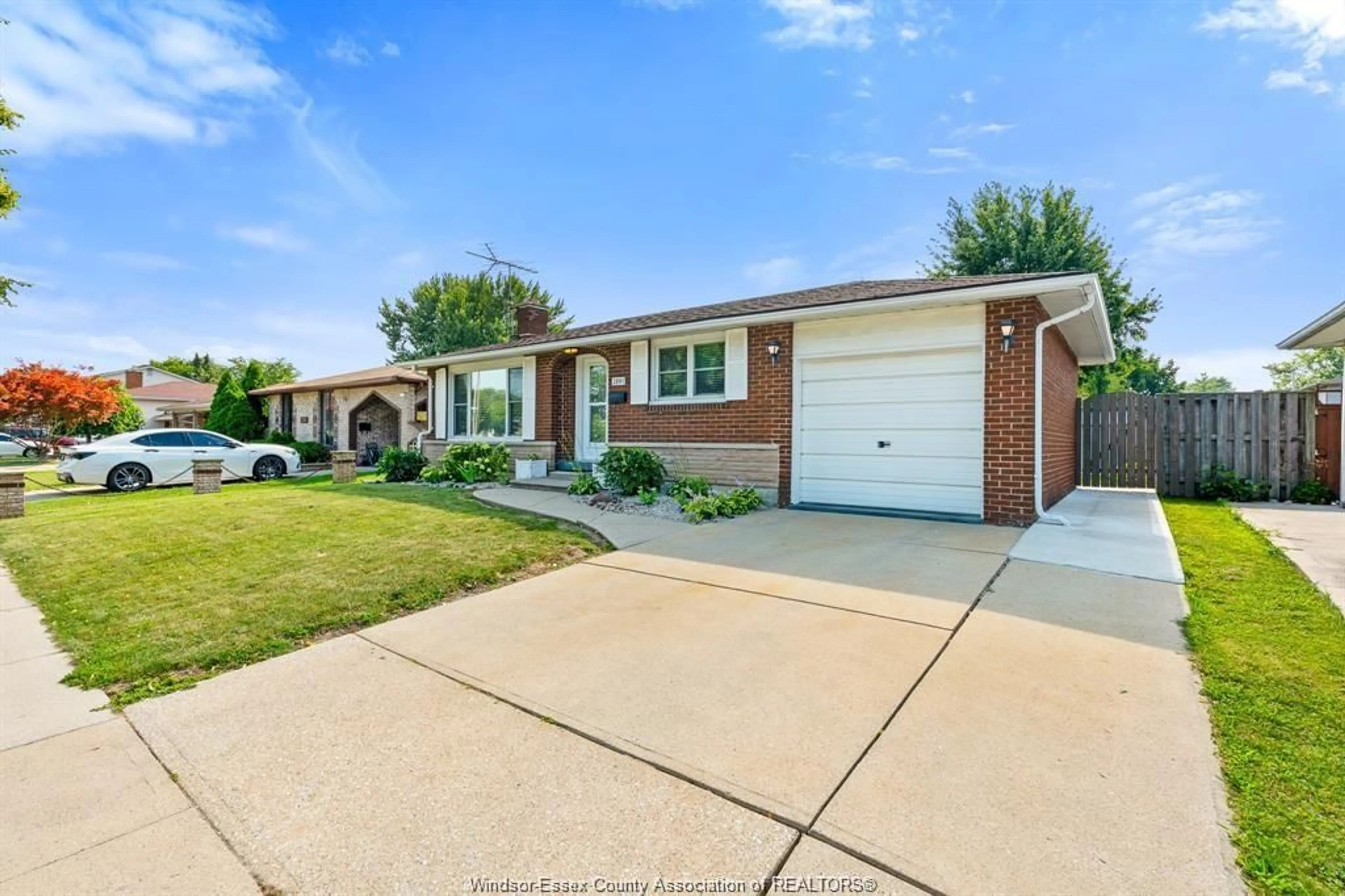 Home with brick exterior material, street for 2891 FOREST GLADE Dr, Windsor Ontario N8R 1L4