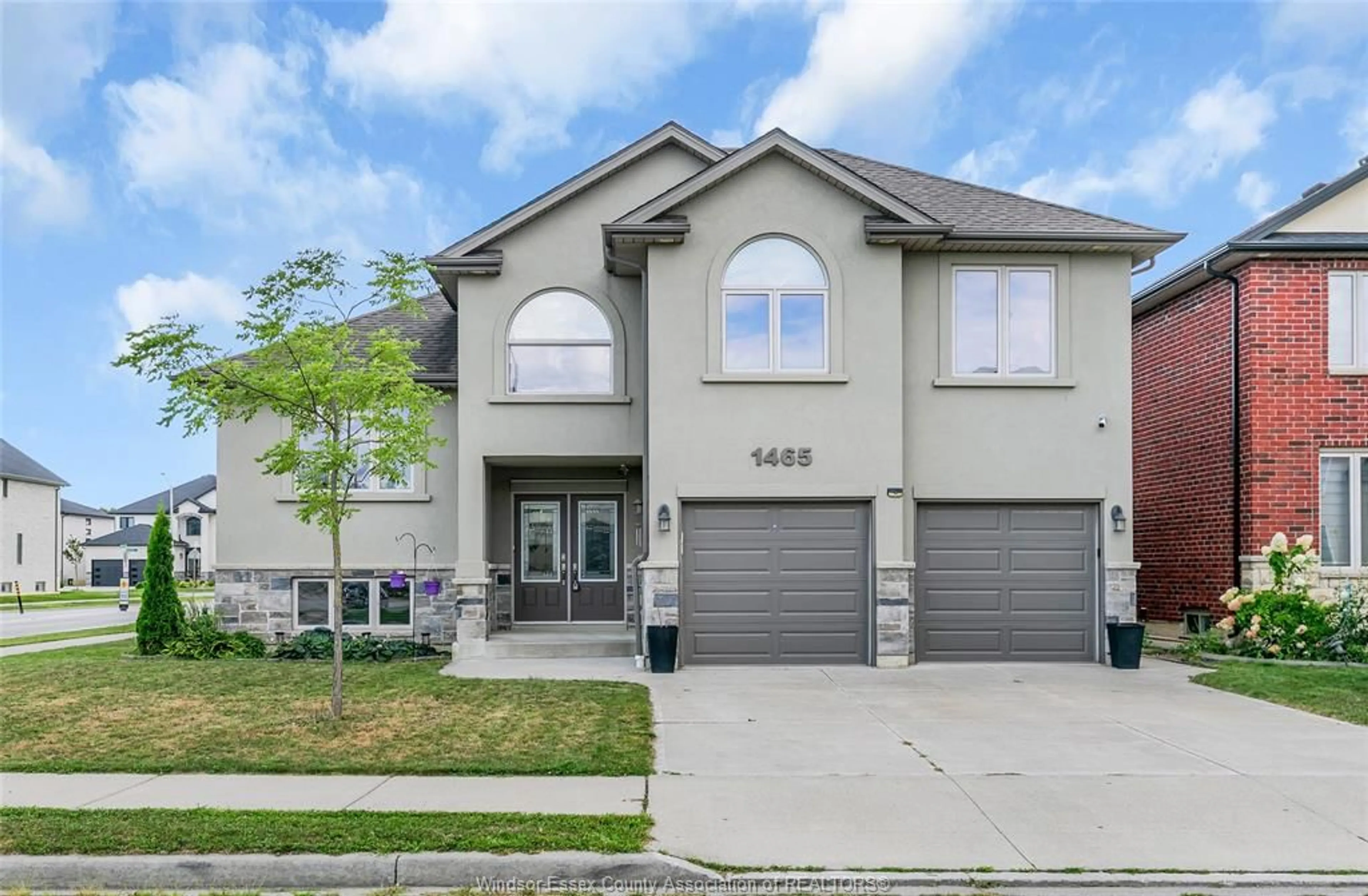 Home with brick exterior material, street for 1465 CANCUN, Windsor Ontario N9G 0A2