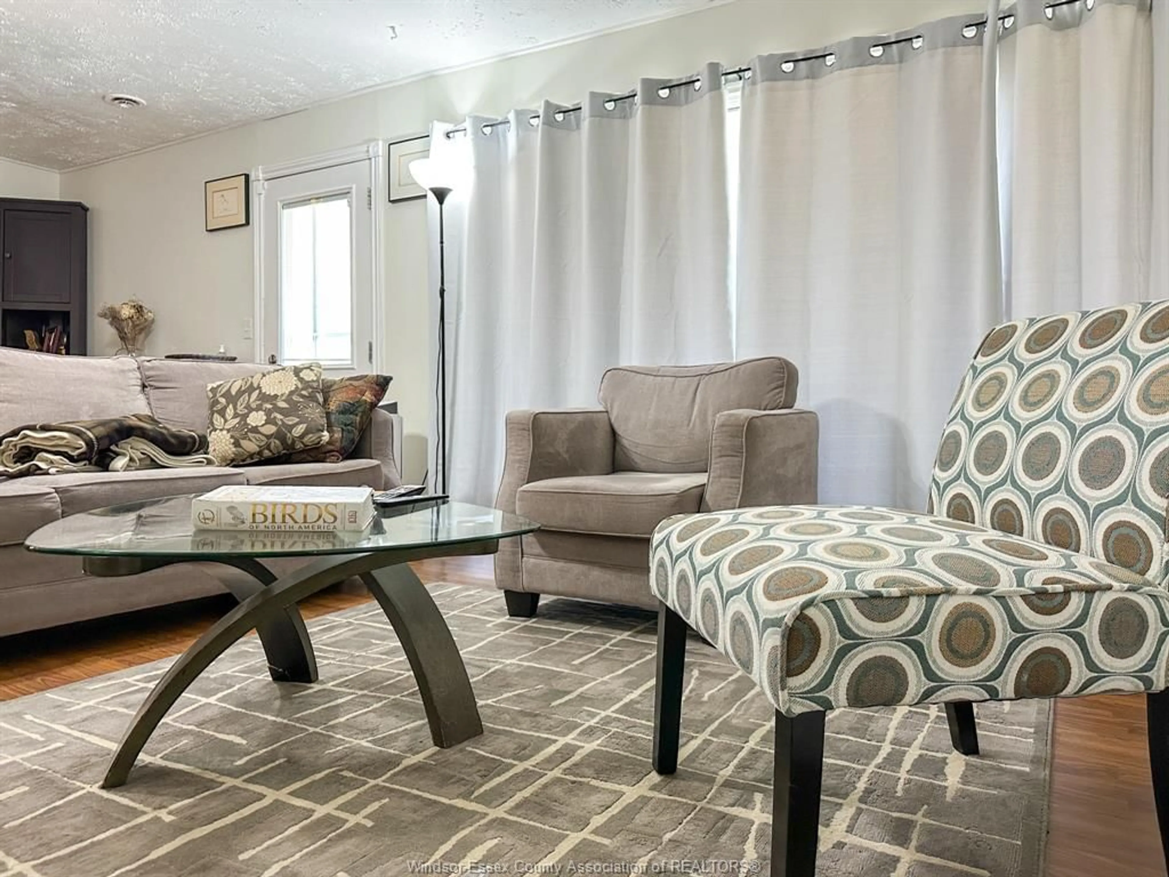 Living room with furniture, carpet floor for 76 BAIRD, Wheatley Ontario N0P 2P0