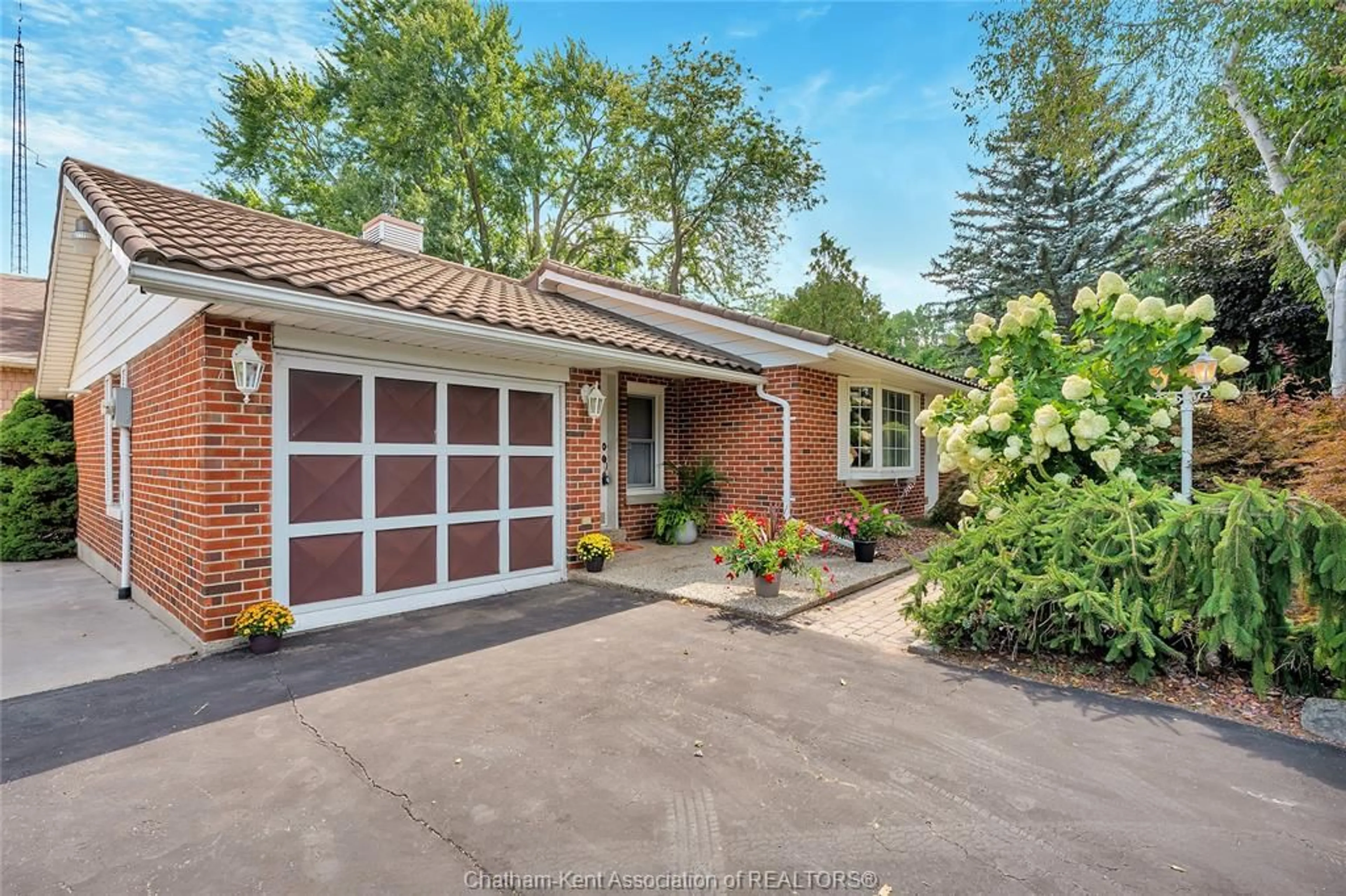 Home with brick exterior material, street for 12980 LONGWOODS Rd, Thamesville Ontario N0P 2K0