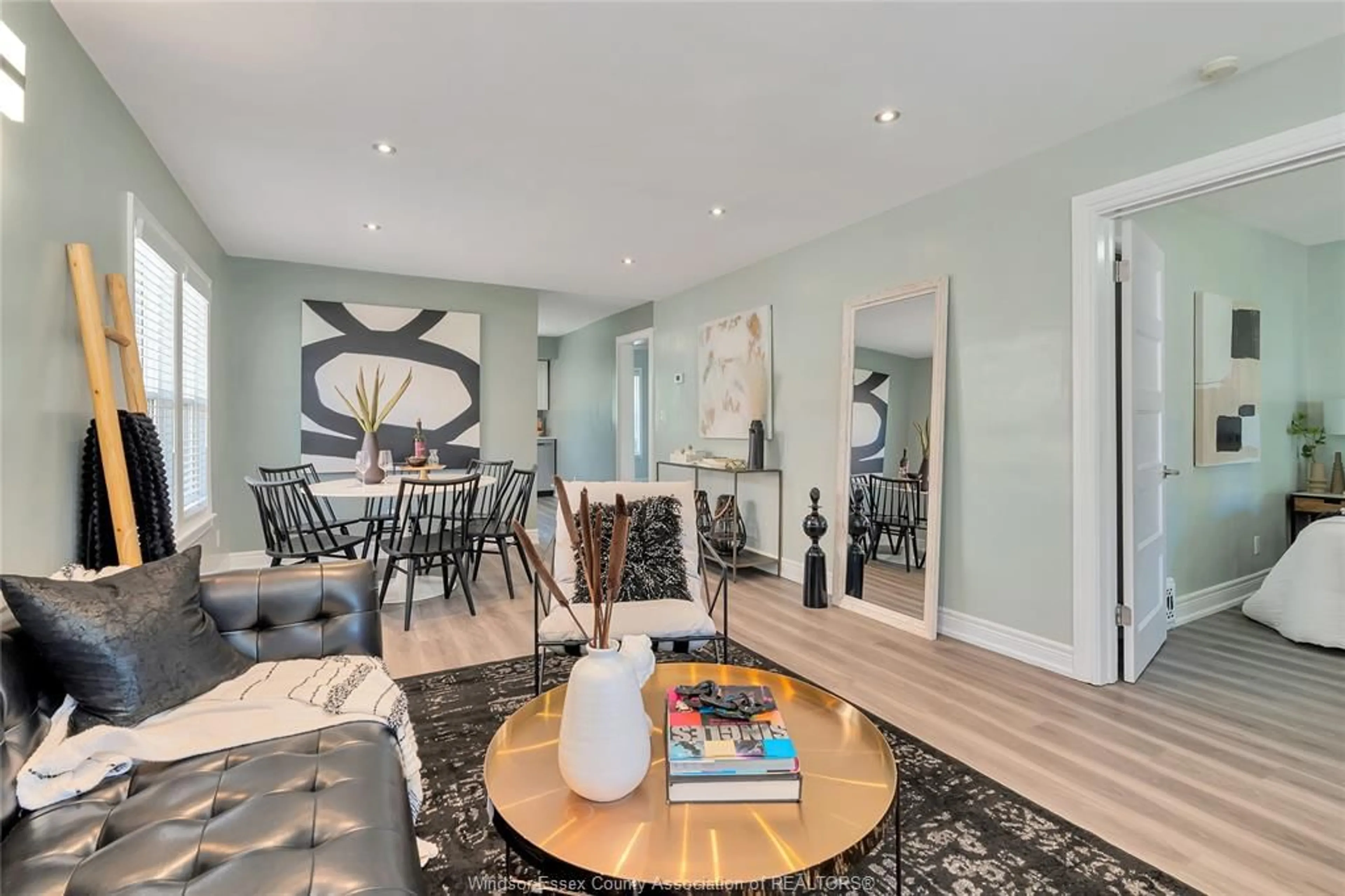 Living room with furniture, wood/laminate floor for 1074 FELIX, Windsor Ontario N9C 3L5