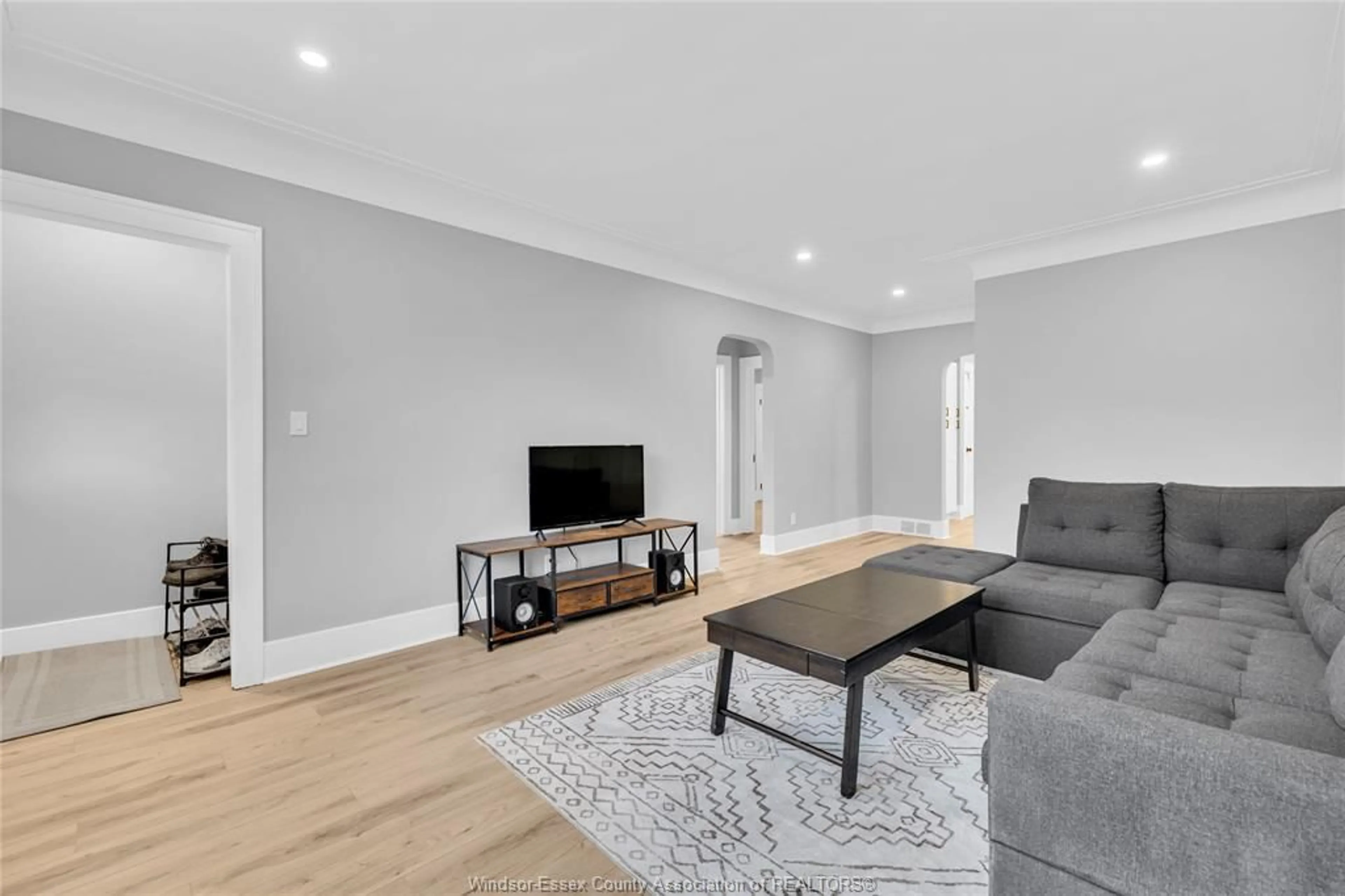 Living room with furniture, wood/laminate floor for 1618 MOY Ave, Windsor Ontario N8X 3J8
