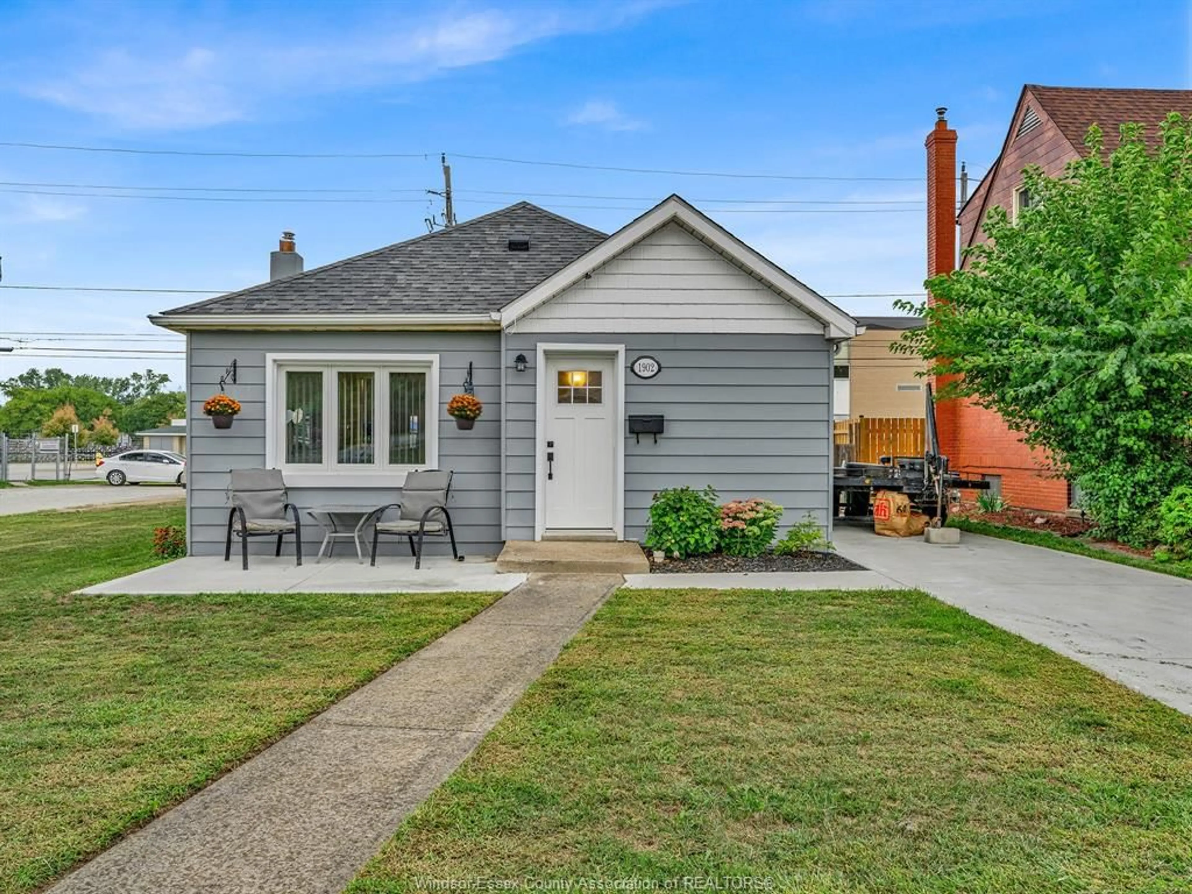Home with brick exterior material, street for 1902 Tourangeau Rd, Windsor Ontario N8W 4N3