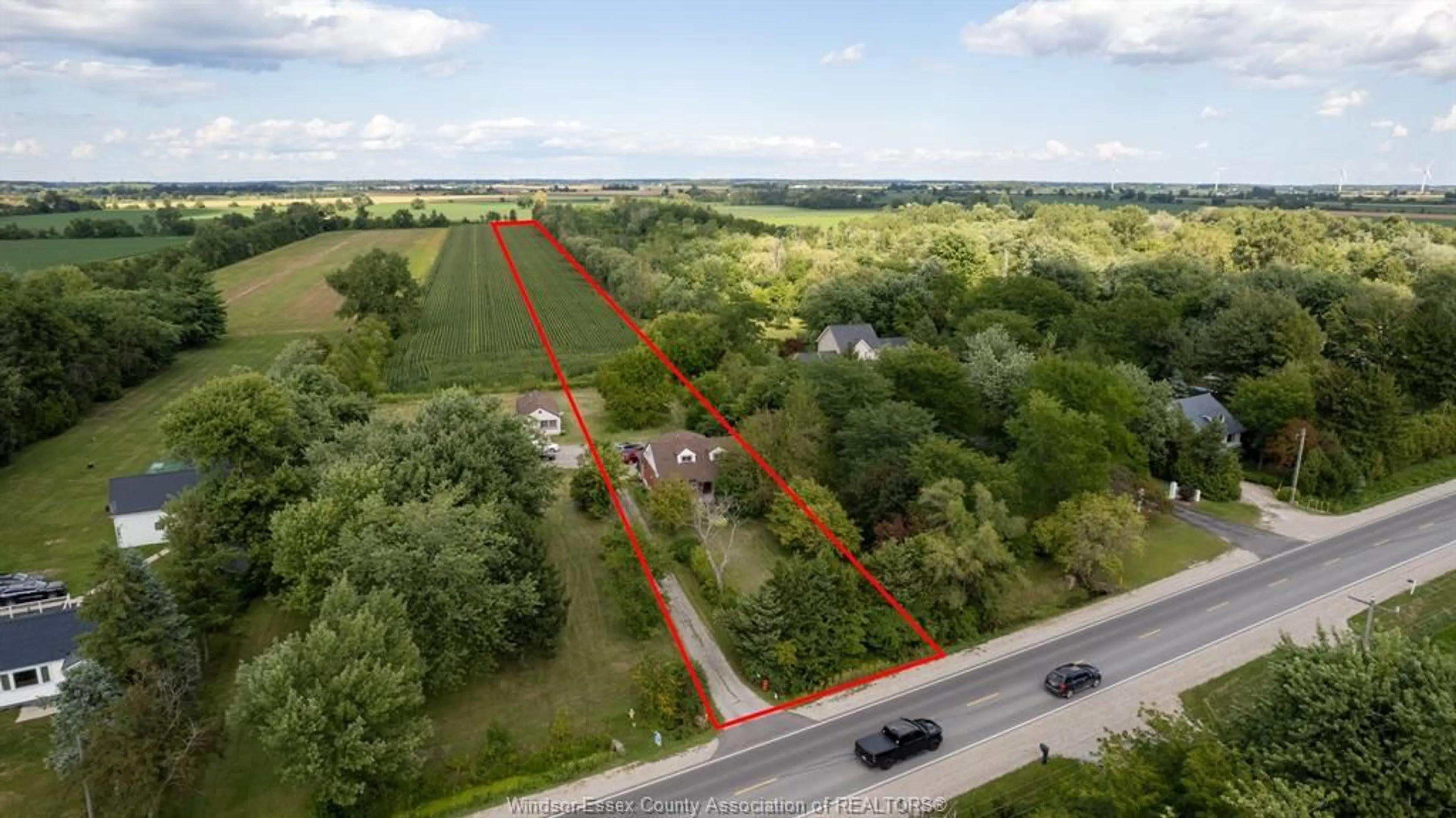 A pic from outside/outdoor area/front of a property/back of a property/a pic from drone, unknown for 655 TALBOT Rd, Lakeshore Ontario N0R 1K0