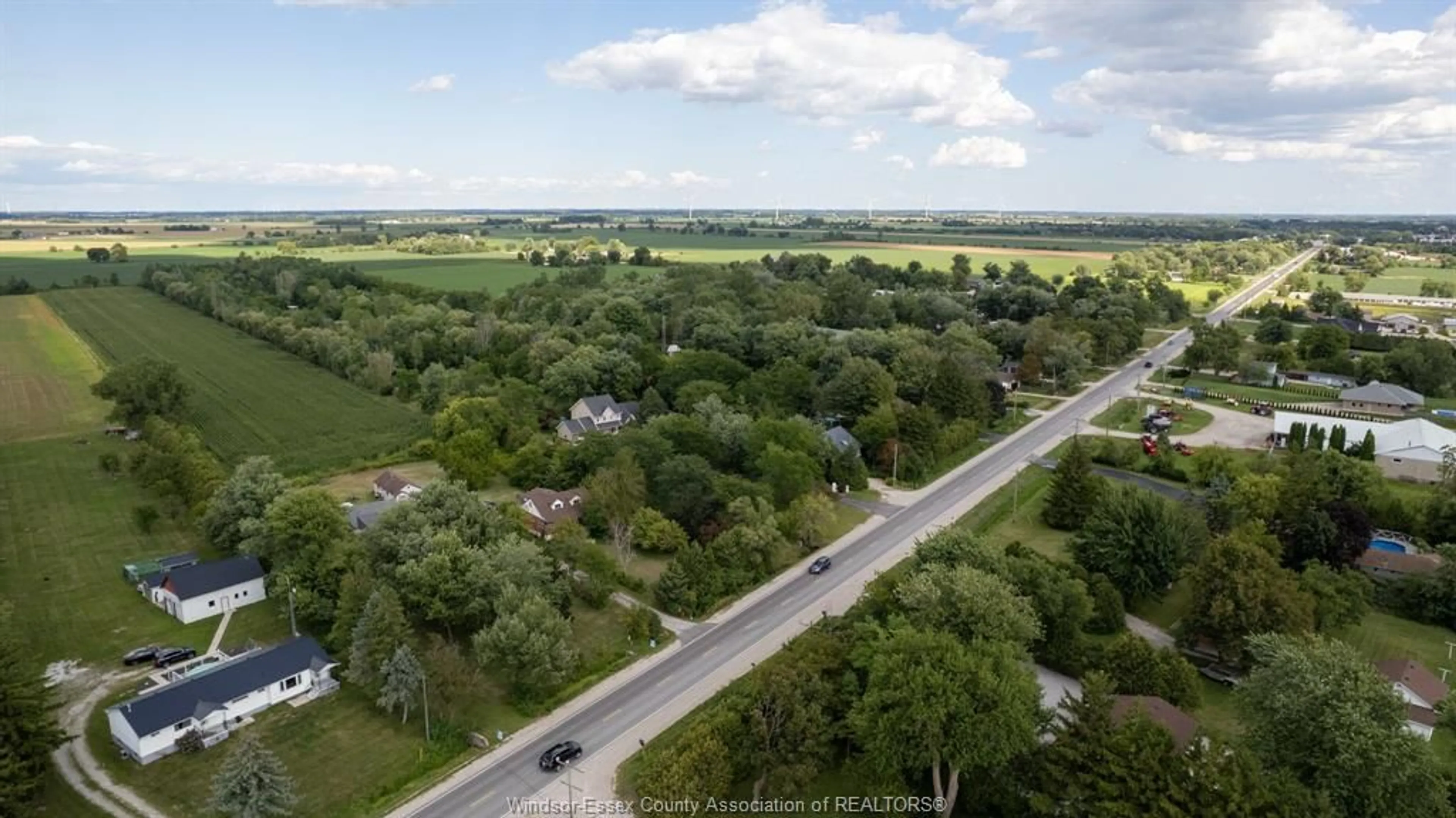 A pic from outside/outdoor area/front of a property/back of a property/a pic from drone, street for 655 TALBOT Rd, Lakeshore Ontario N0R 1K0