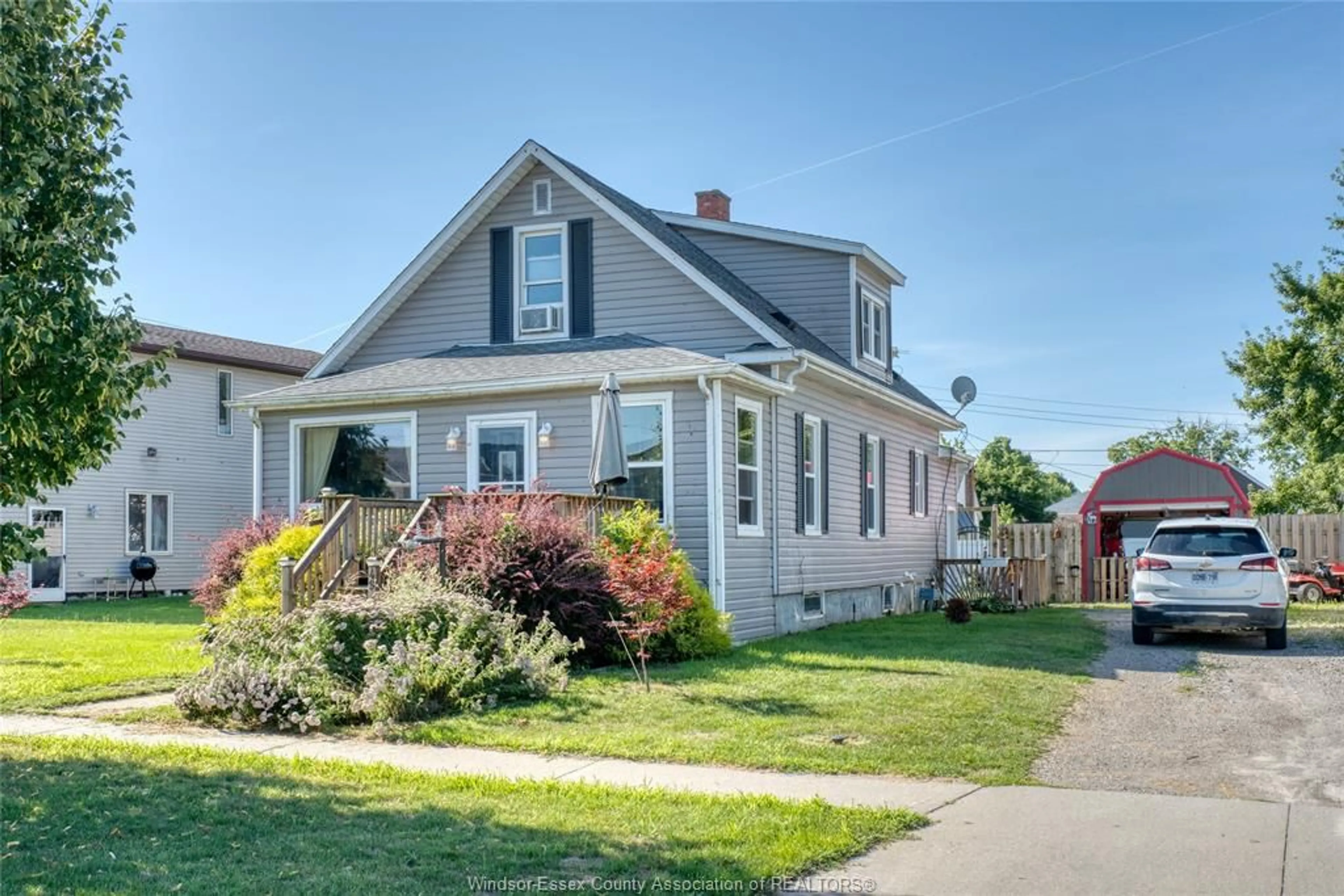 Home with vinyl exterior material, street for 49 MAPLE St, Kingsville Ontario N9Y 1L8