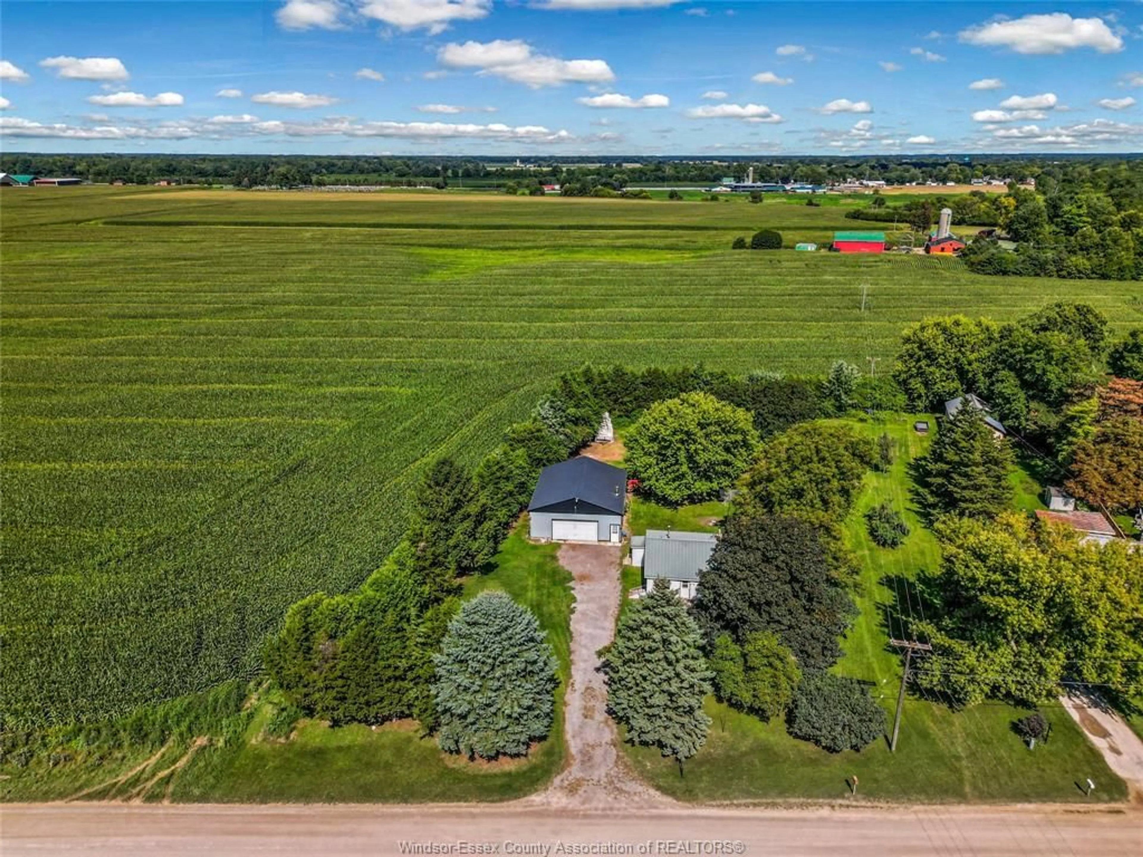 A pic from outside/outdoor area/front of a property/back of a property/a pic from drone, unknown for 23365 Dew Drop Rd, Thamesville Ontario N0P 2K0
