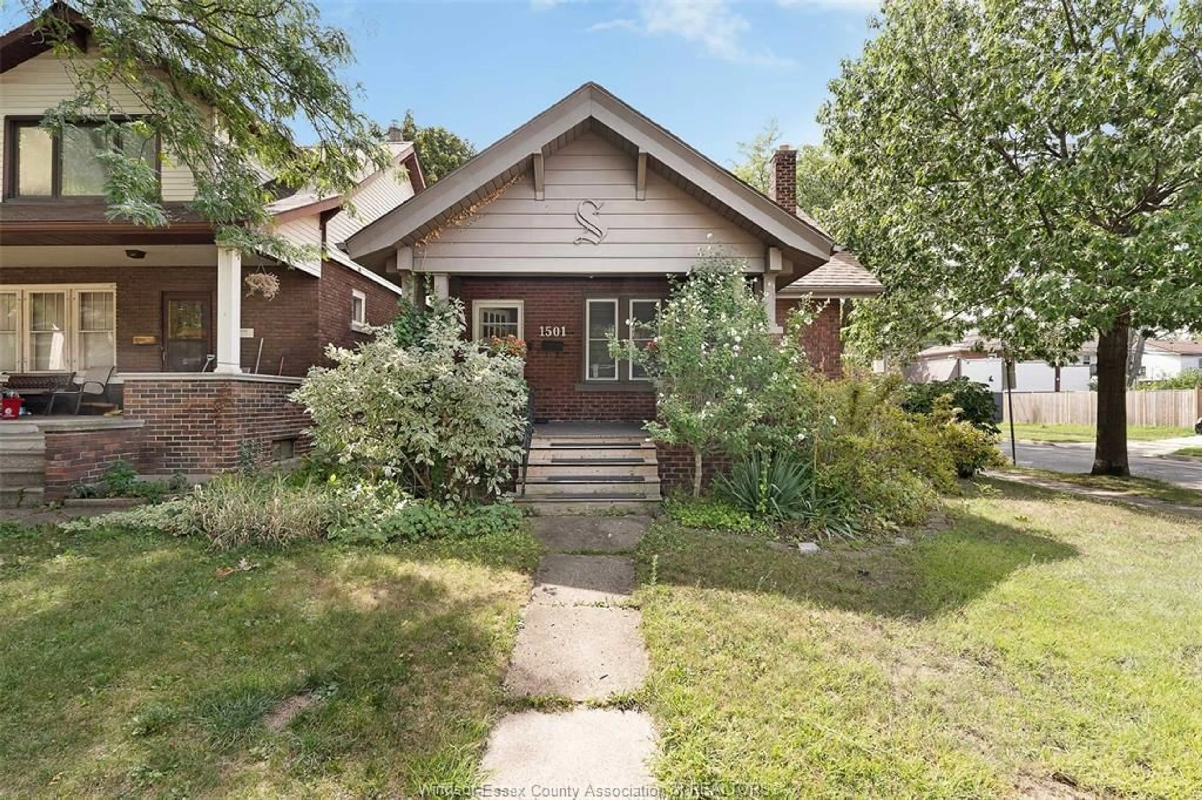 Home with brick exterior material, street for 1501 DOUGALL Ave, Windsor Ontario N8X 1S2
