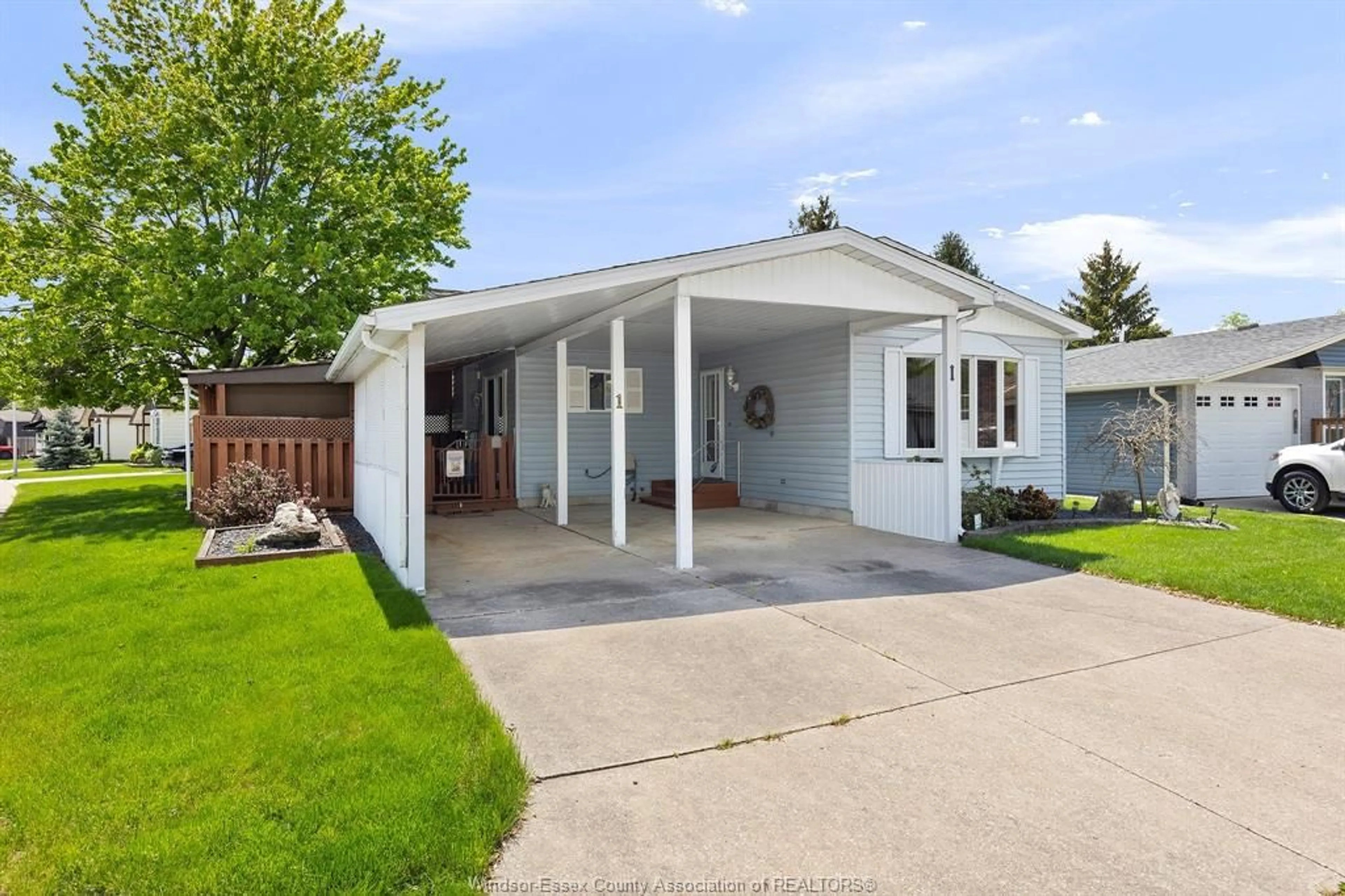 Home with vinyl exterior material, street for 1 Birch Pl, McGregor Ontario N0R 1J0