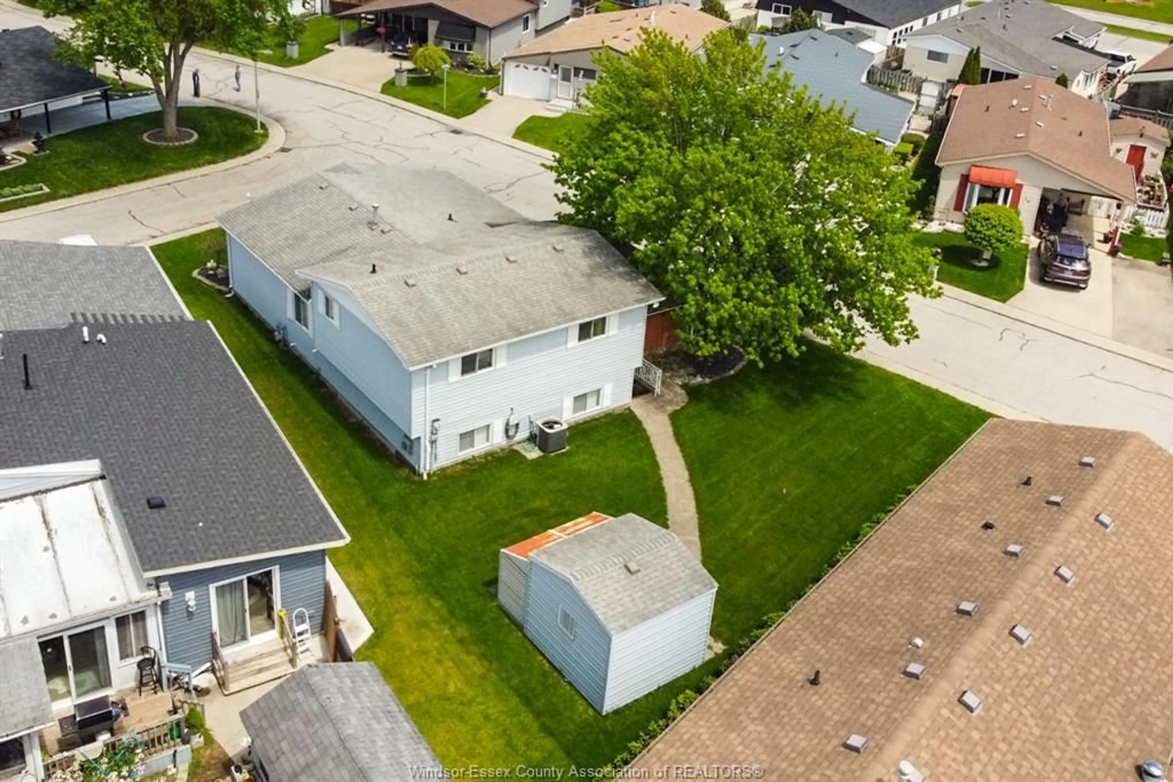 A pic from outside/outdoor area/front of a property/back of a property/a pic from drone, street for 1 Birch Pl, McGregor Ontario N0R 1J0