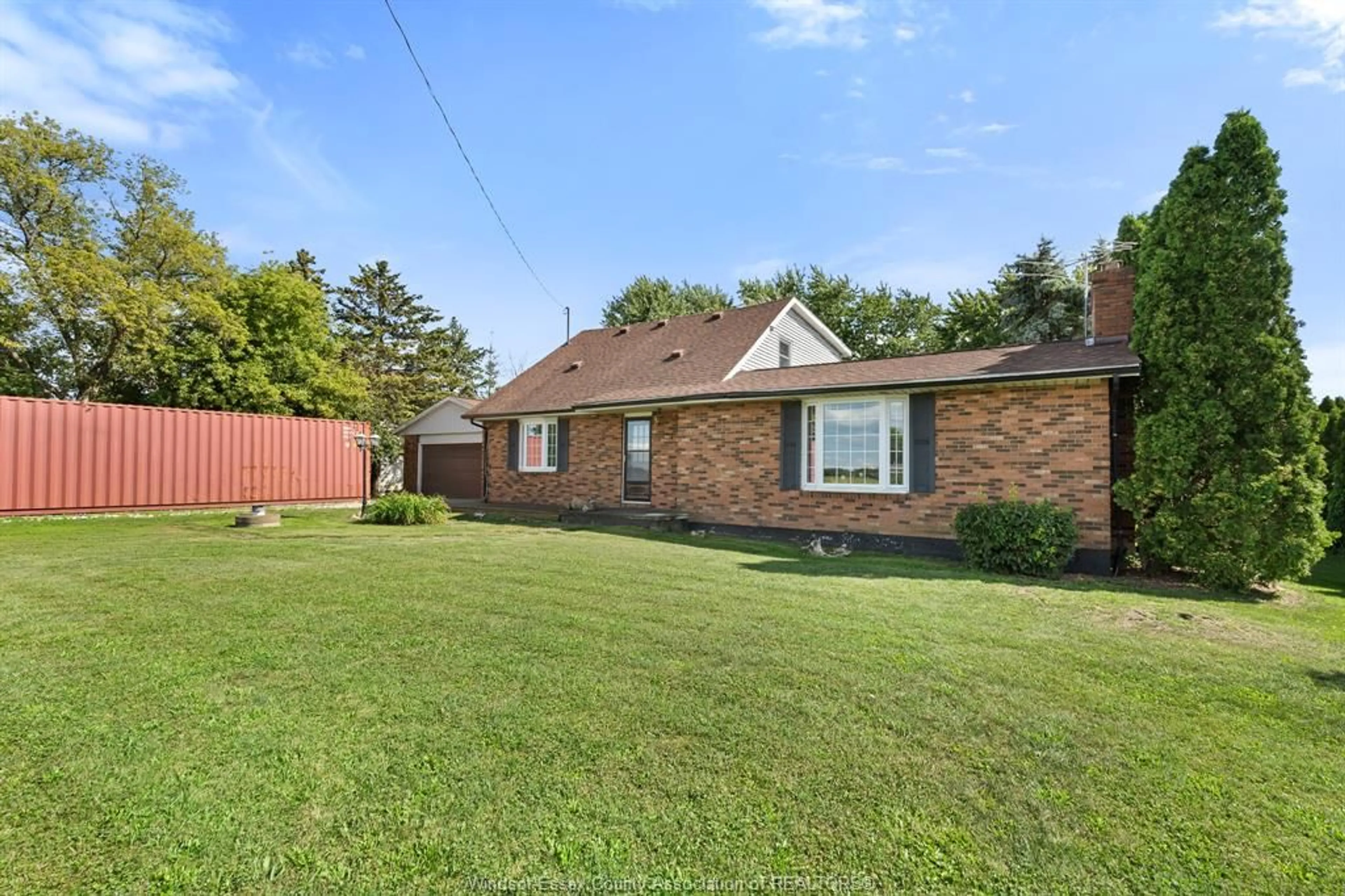 Home with brick exterior material, street for 220 ROAD 8 W, Kingsville Ontario N8M 2X5