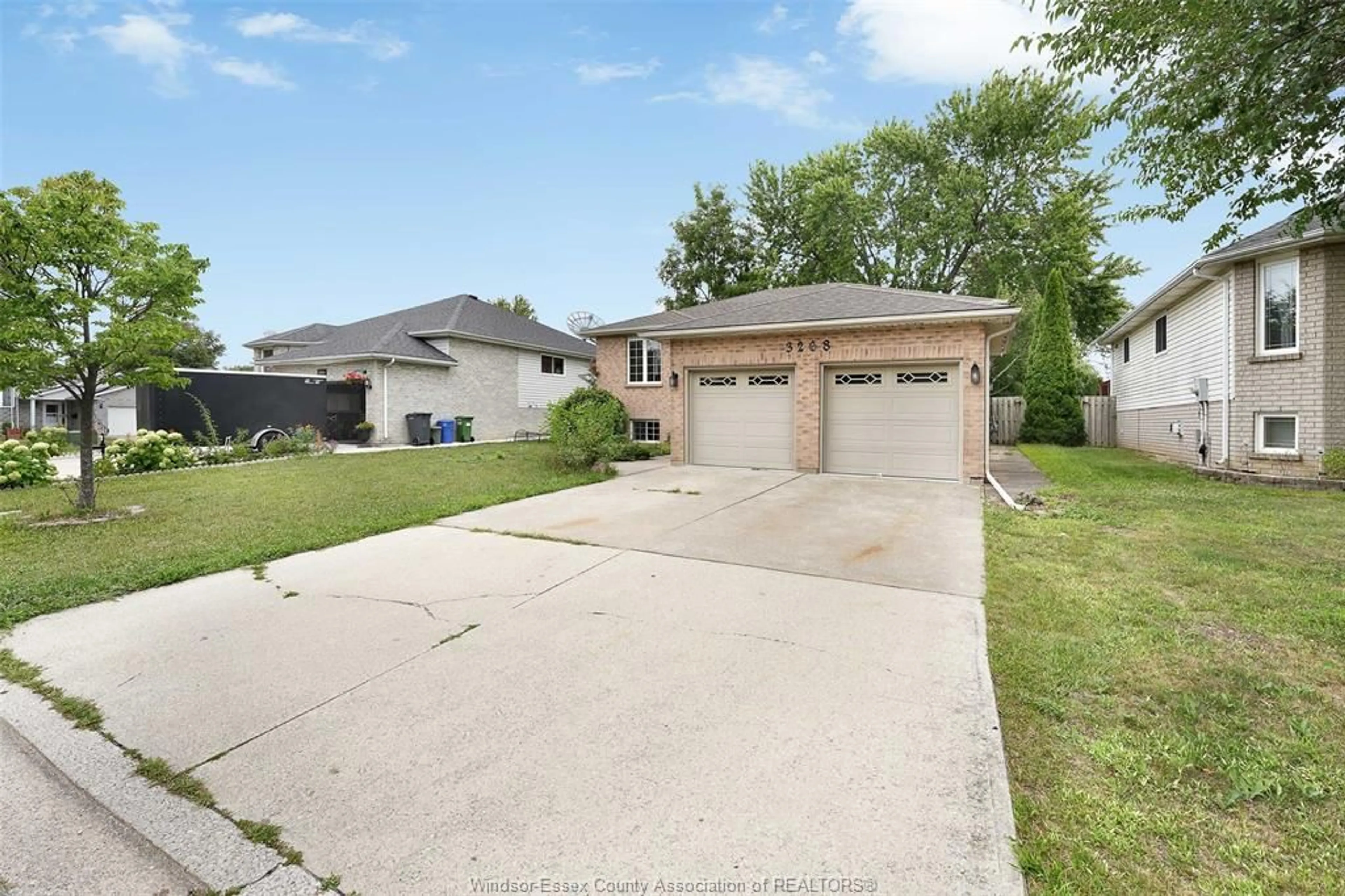 A pic from outside/outdoor area/front of a property/back of a property/a pic from drone, street for 3268 ROBINET Rd, Windsor Ontario N8R 2J6